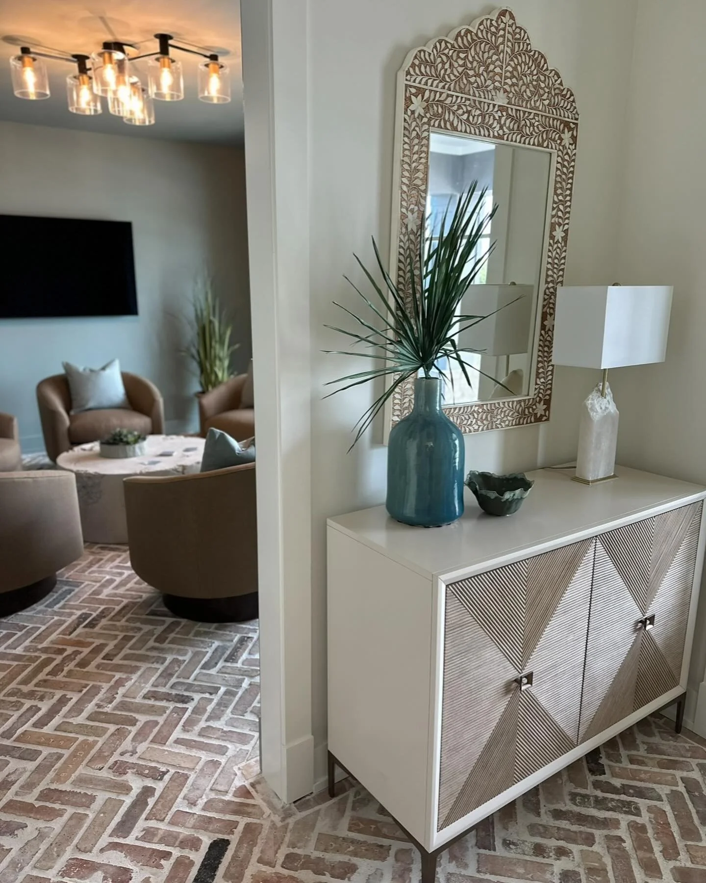 A favorite moment in this entry at our Cape San Blas, Florida project.  Can&rsquo;t get enough of the texture of the brick floors to the smoky blue/green walls and ceiling in the Lounge! 

#abid #floridadesign  #beachhouse #classiccoastal