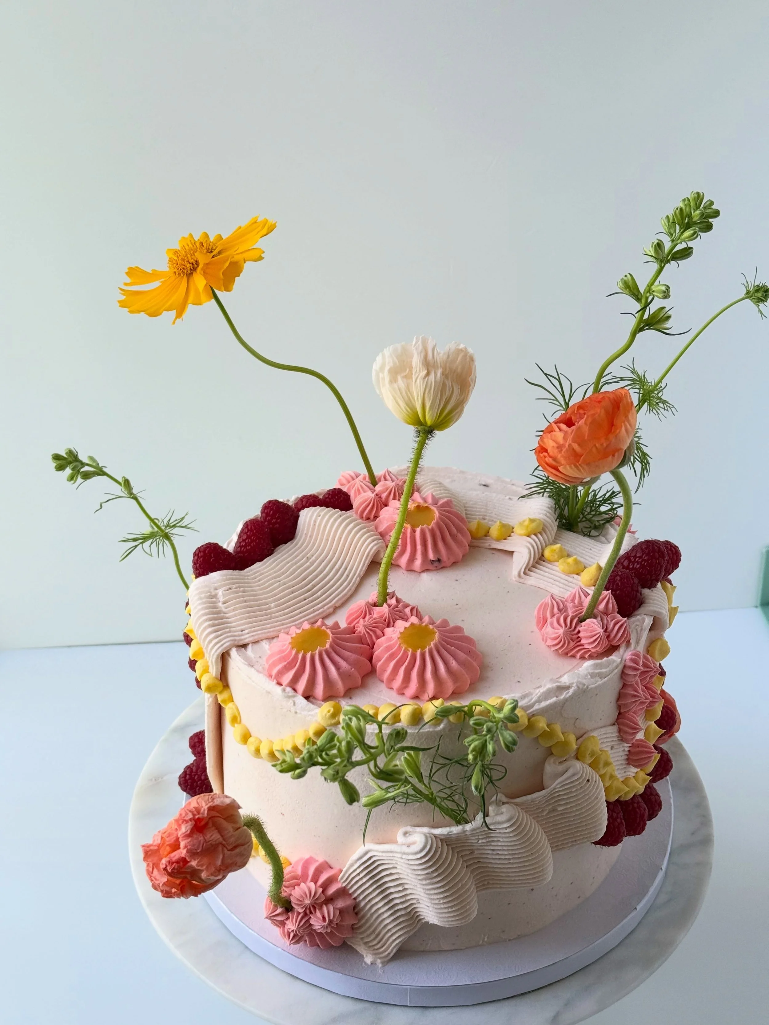 Fell Flower Cake 🌸

✨ help me get this cake a better name!

✨ I got all the flowers from a new local flower shop called @fell_flowers that I absolutely fell in love with

✨ and yes, the flowers I used are mostly inedible, but I put them safely into 