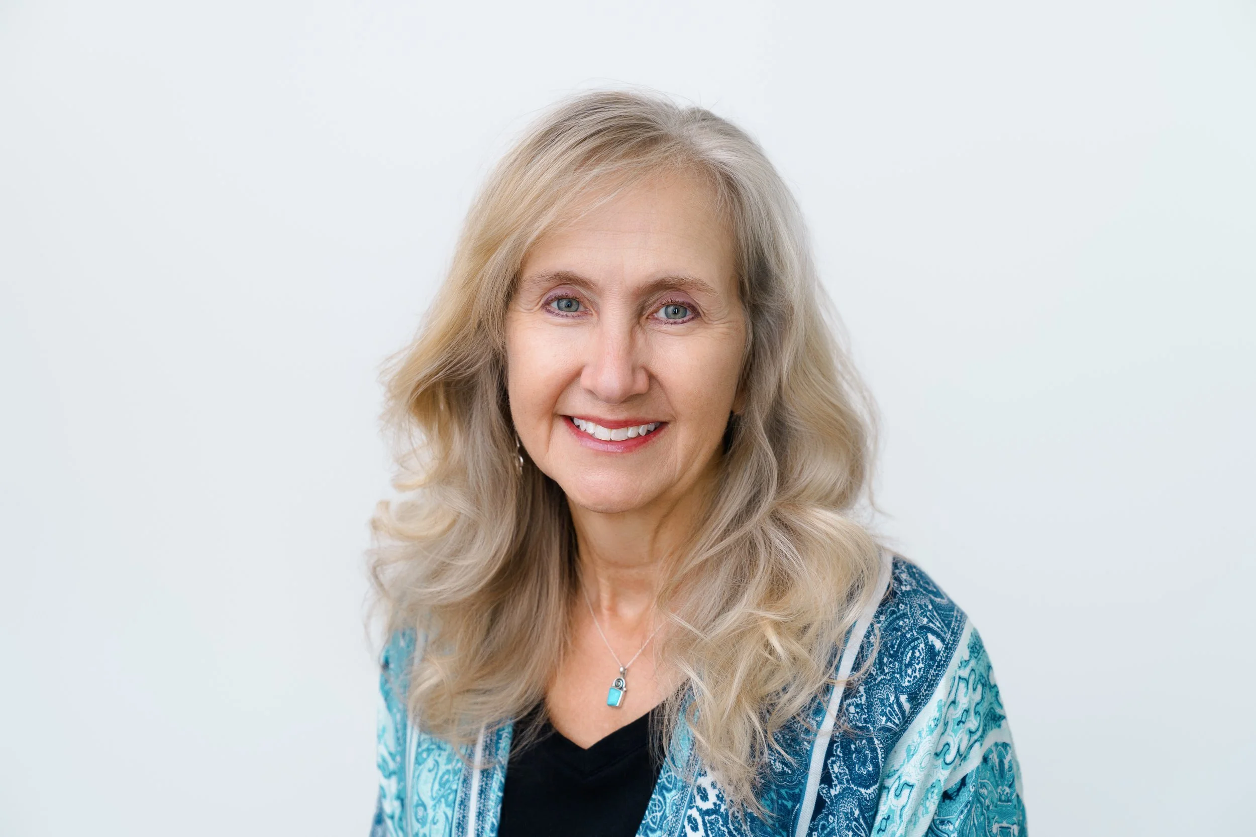 WHAT TO WEAR FOR A PROFESSIONAL HEADSHOT: A Raleigh Photographer's 2026 Guide