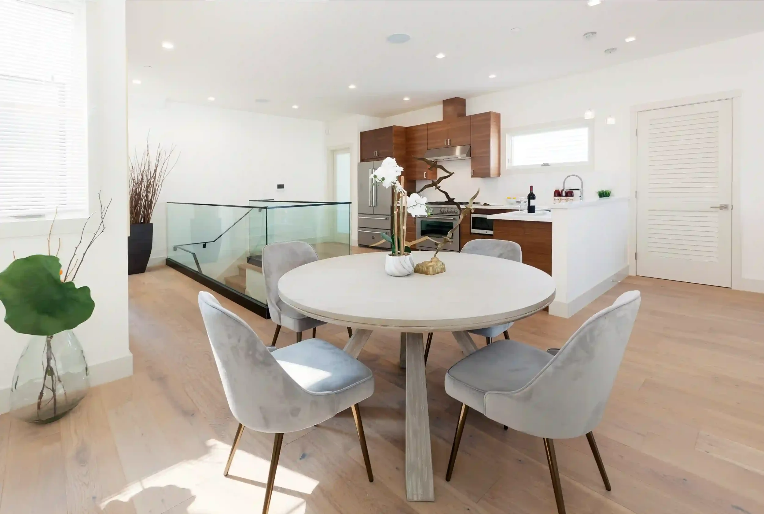 Dining nook in modern condo unit engineered for efficient vertical and lateral support