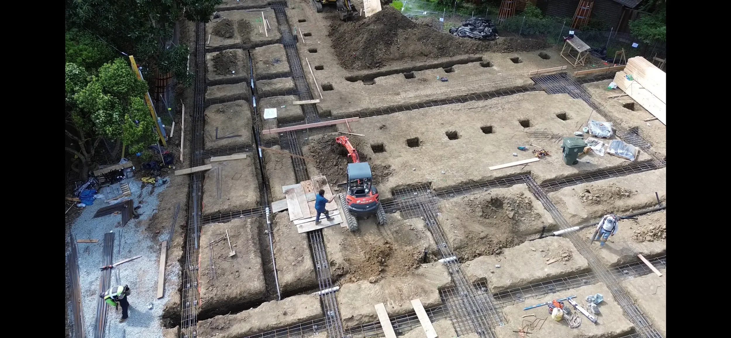 Aerial view of foundation and rebar placement for Bay Area residential construction engineered by Massoudi Consulting Engineers