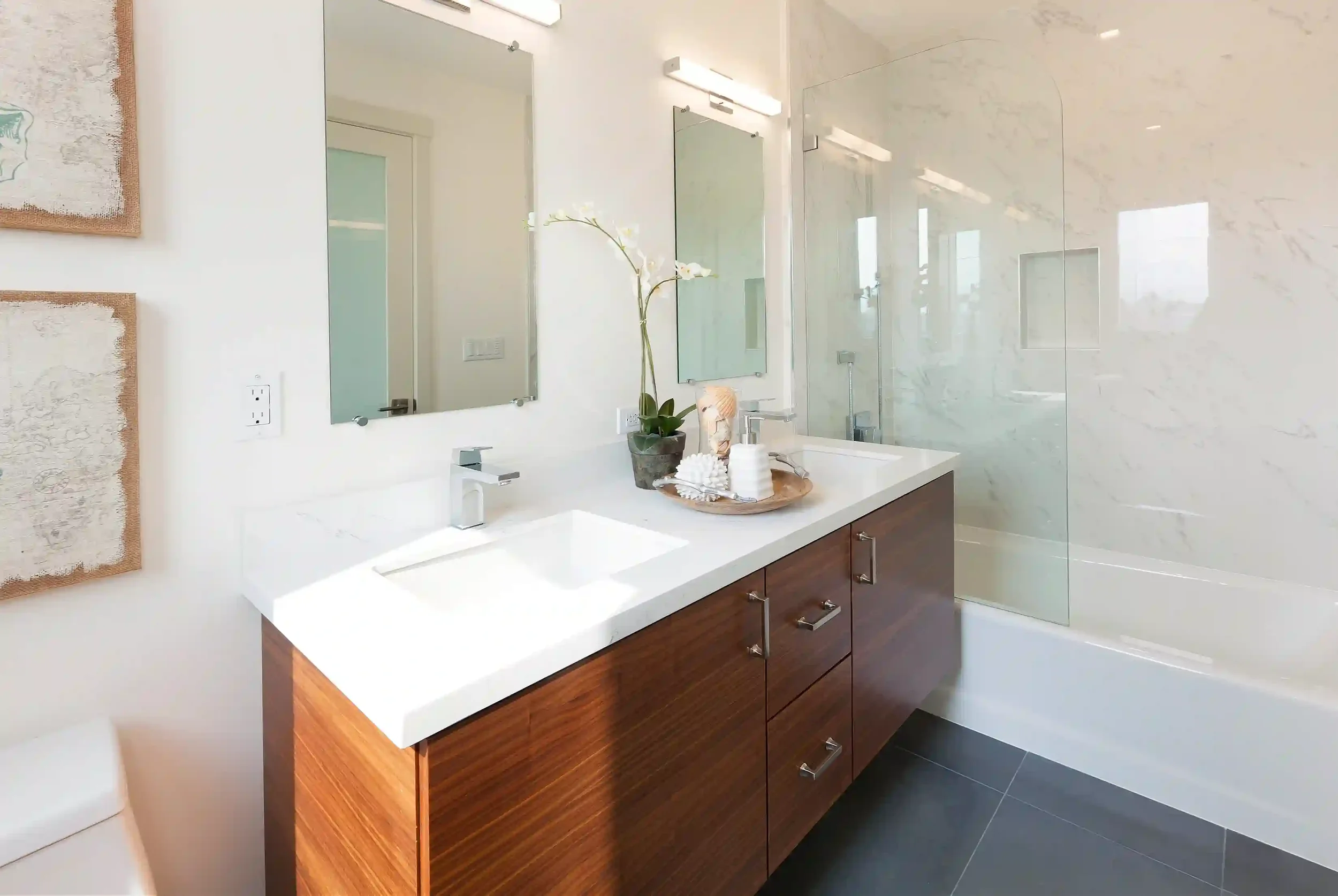 Dual-sink bathroom with wall framing adjustments for vanity and plumbing