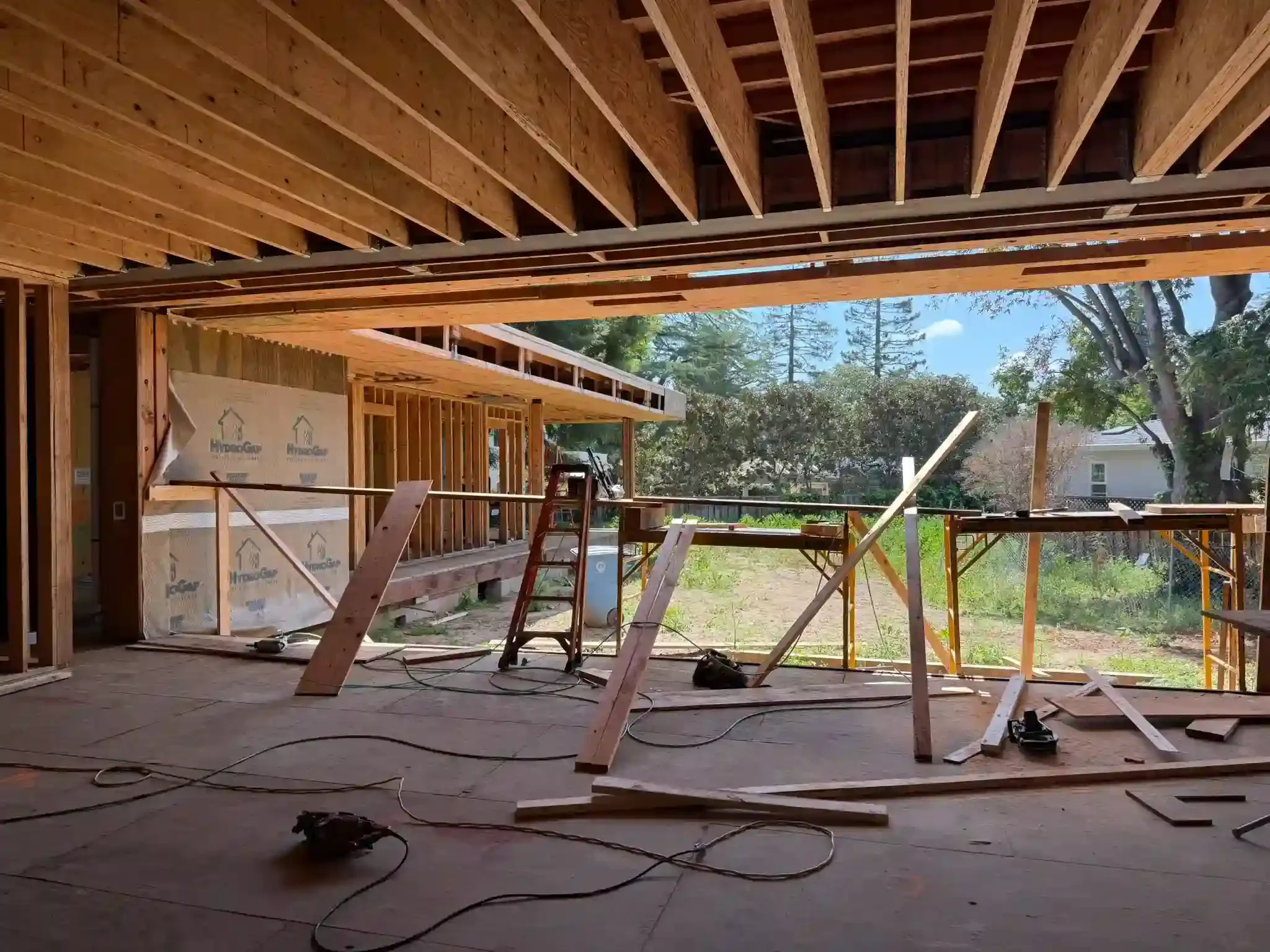 In-progress wood framing and lateral bracing for residential home engineered by Massoudi Consulting Engineers