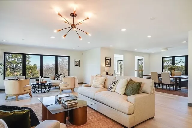 Load-bearing wall removal and beam integration in open dining area