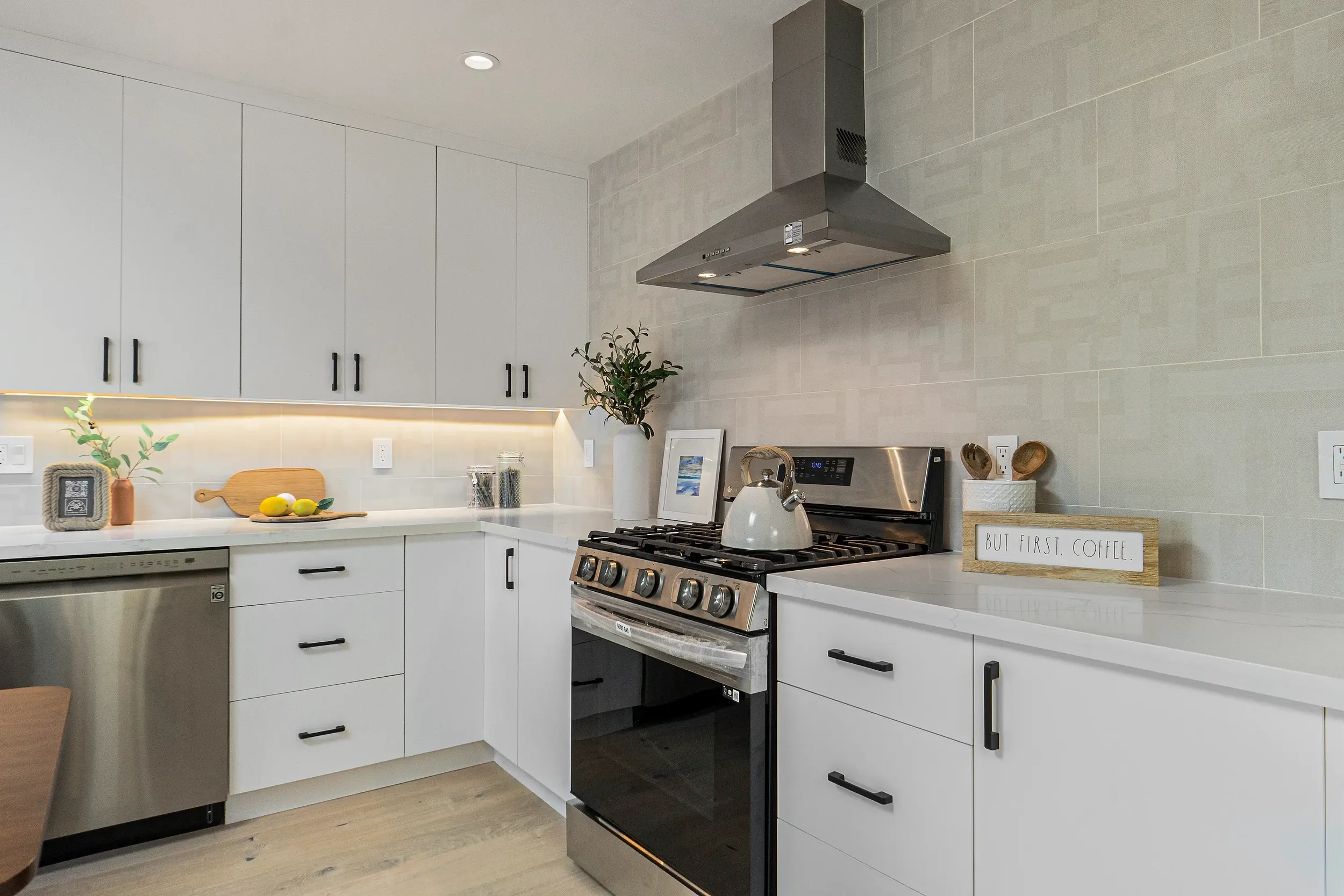 Bright, open living space and modern kitchen in a San Francisco ADU with modern architectural design and structural engineering by Massoudi Consulting Engineers
