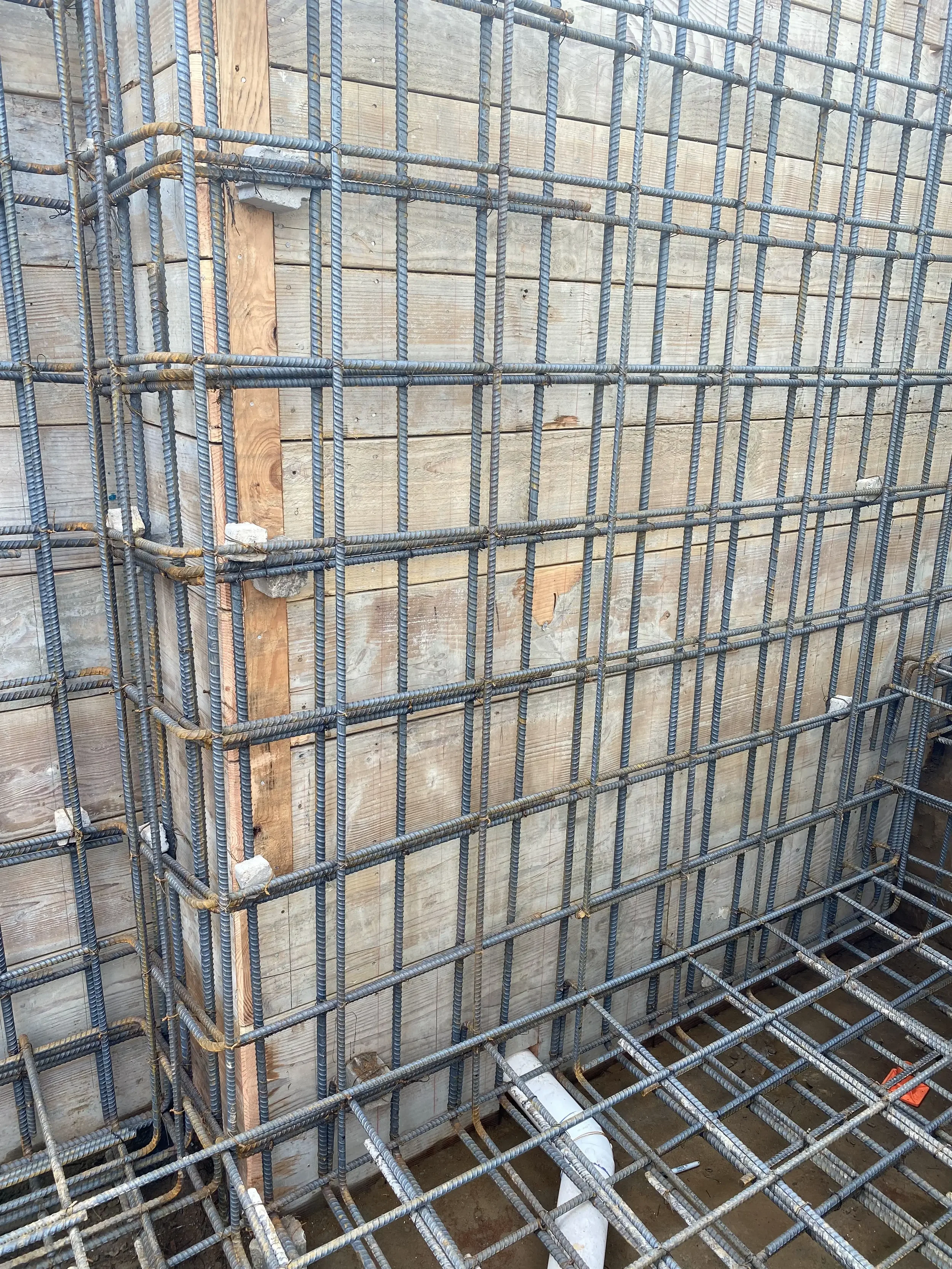 Civil engineering rebar detailing for retaining wall foundation designed by Massoudi Consulting Engineers