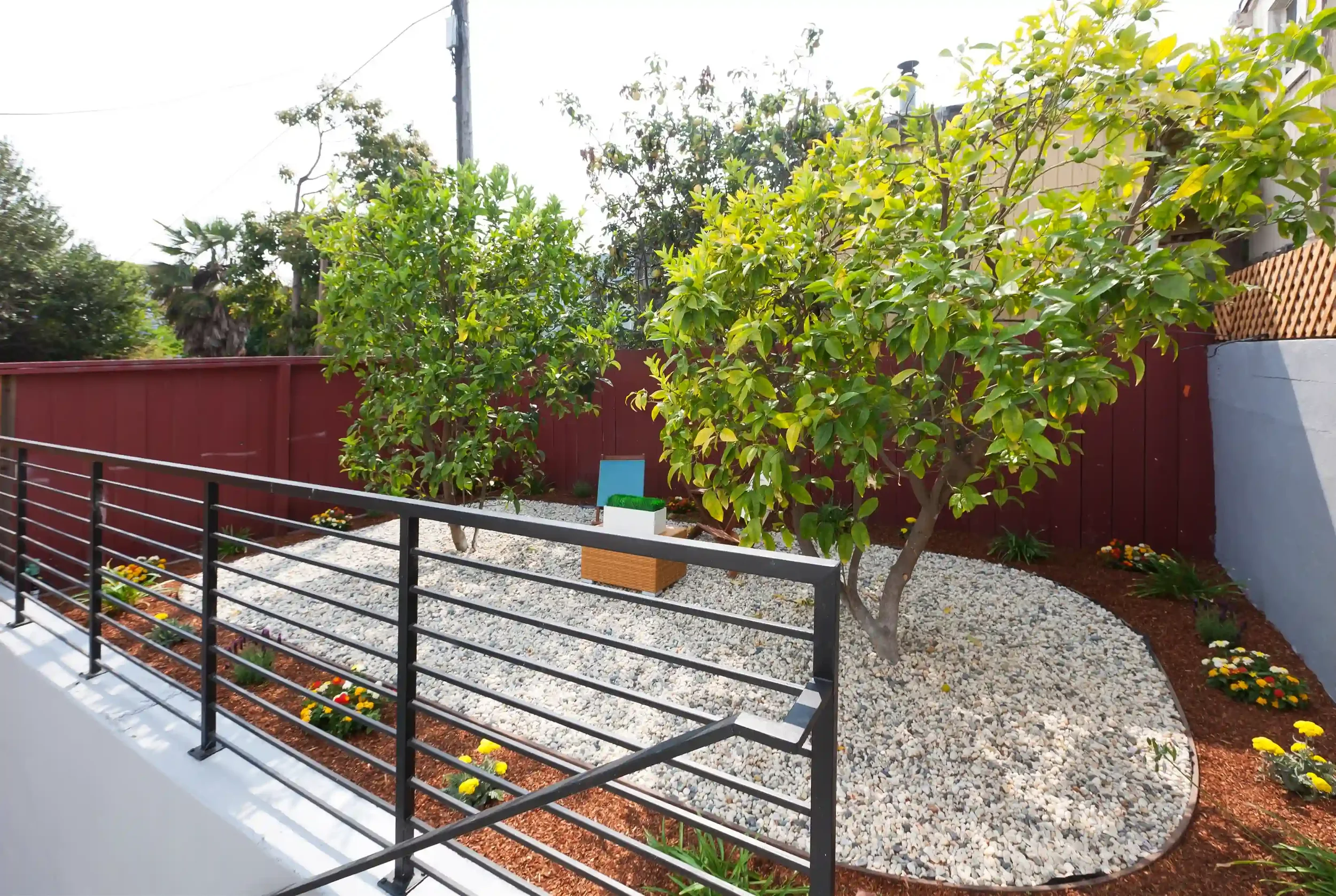 Outdoor patio and garden space with civil and structural drainage integration