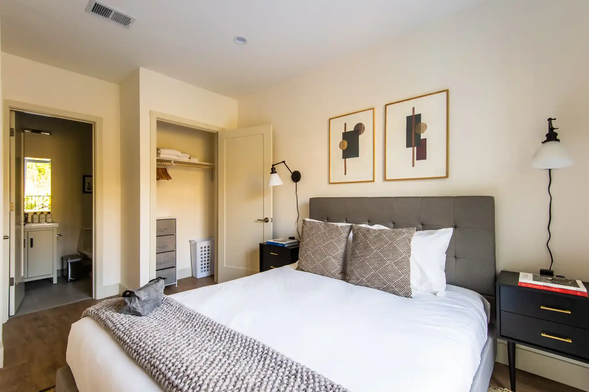 Bedroom corner with open closet and natural light, included in ADU unit