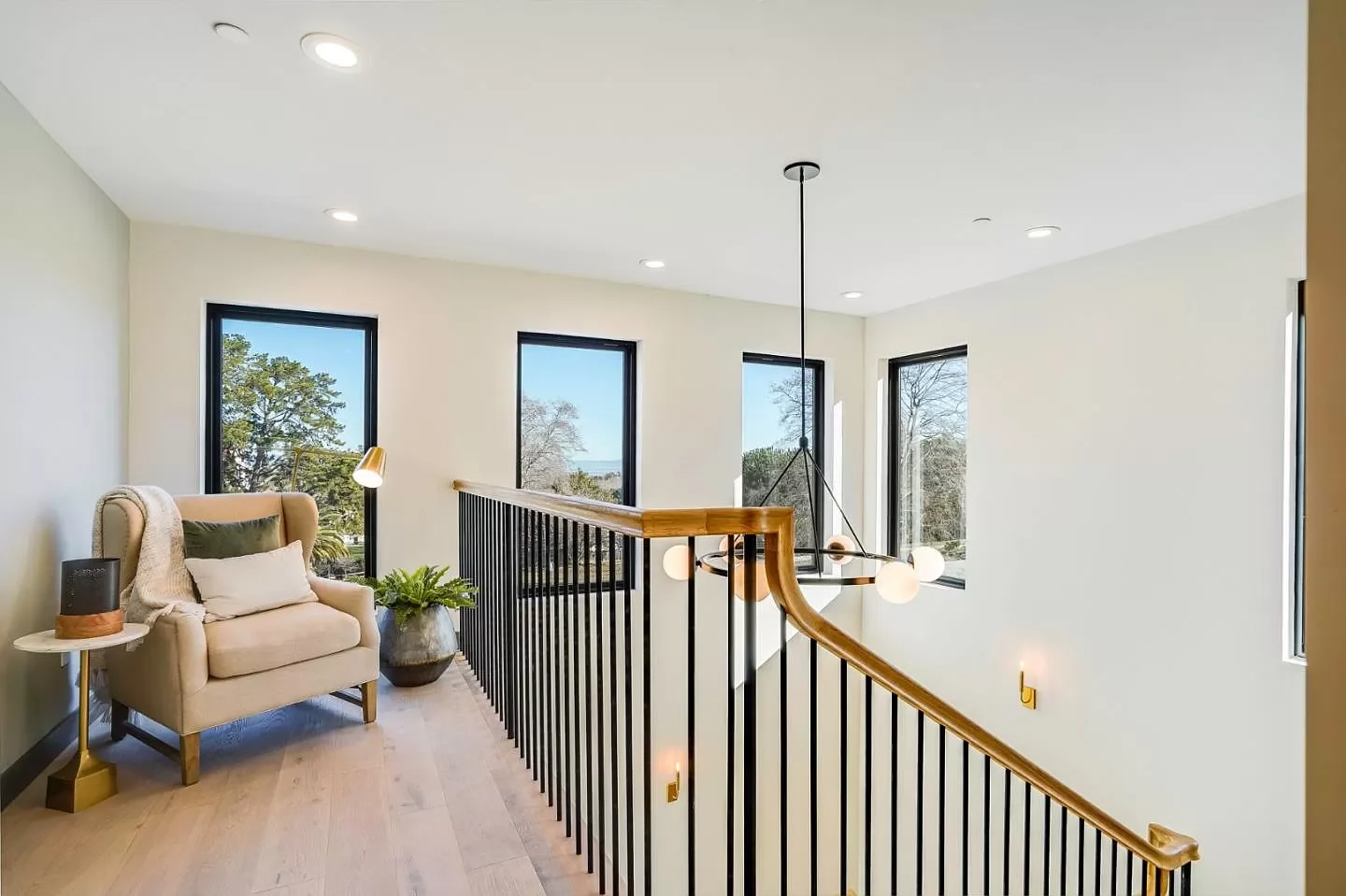 Reinforced stairway landing featuring clerestory windows for natural light