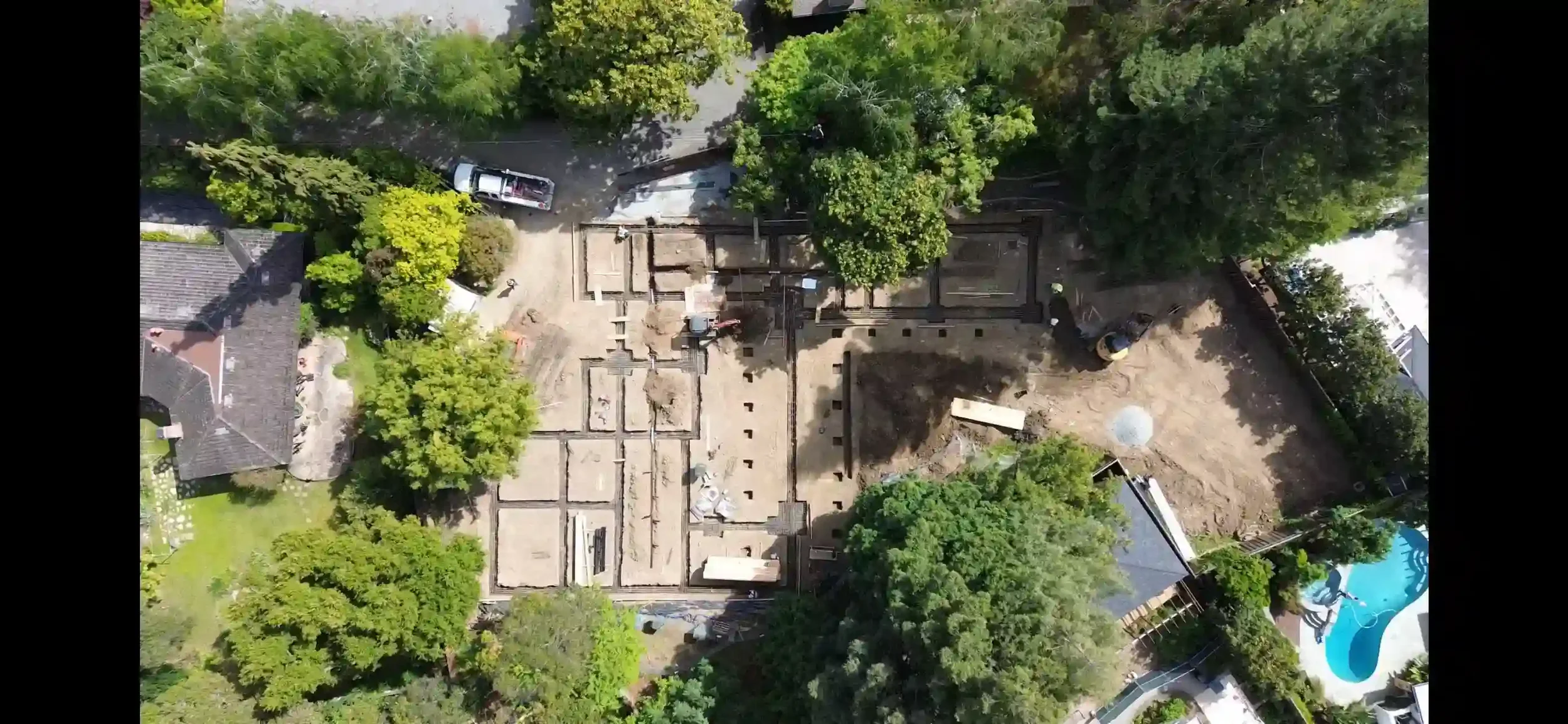 Bird’s-eye view of new single-family home construction with structural engineering foundation layout by Massoudi Consulting Engineers