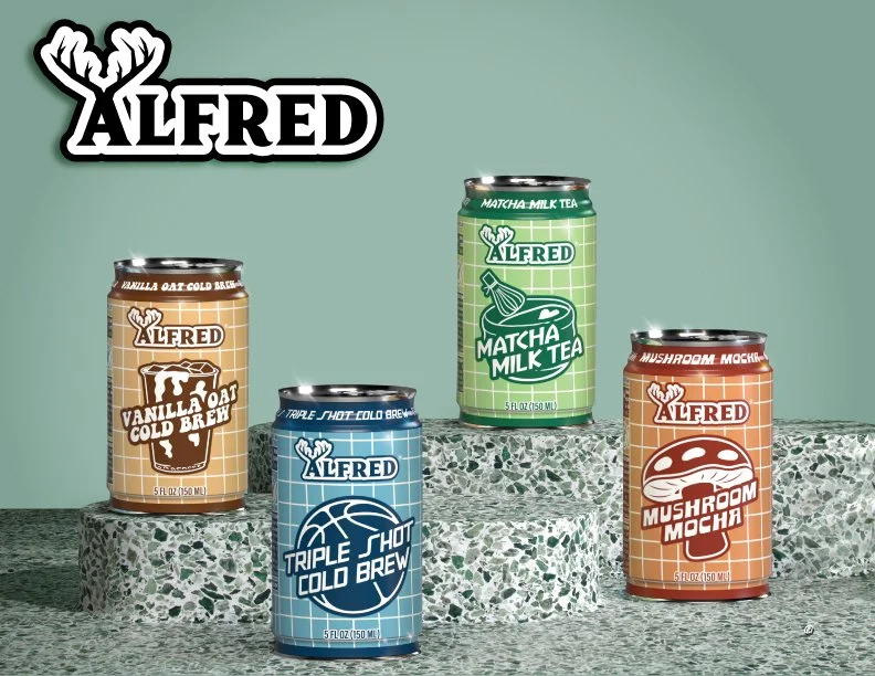 Four cans of Alfred cold brew coffee drinks with different flavors on a textured surface against a green wall, with the Alfred logo and a stylized deer head in the top left corner.
