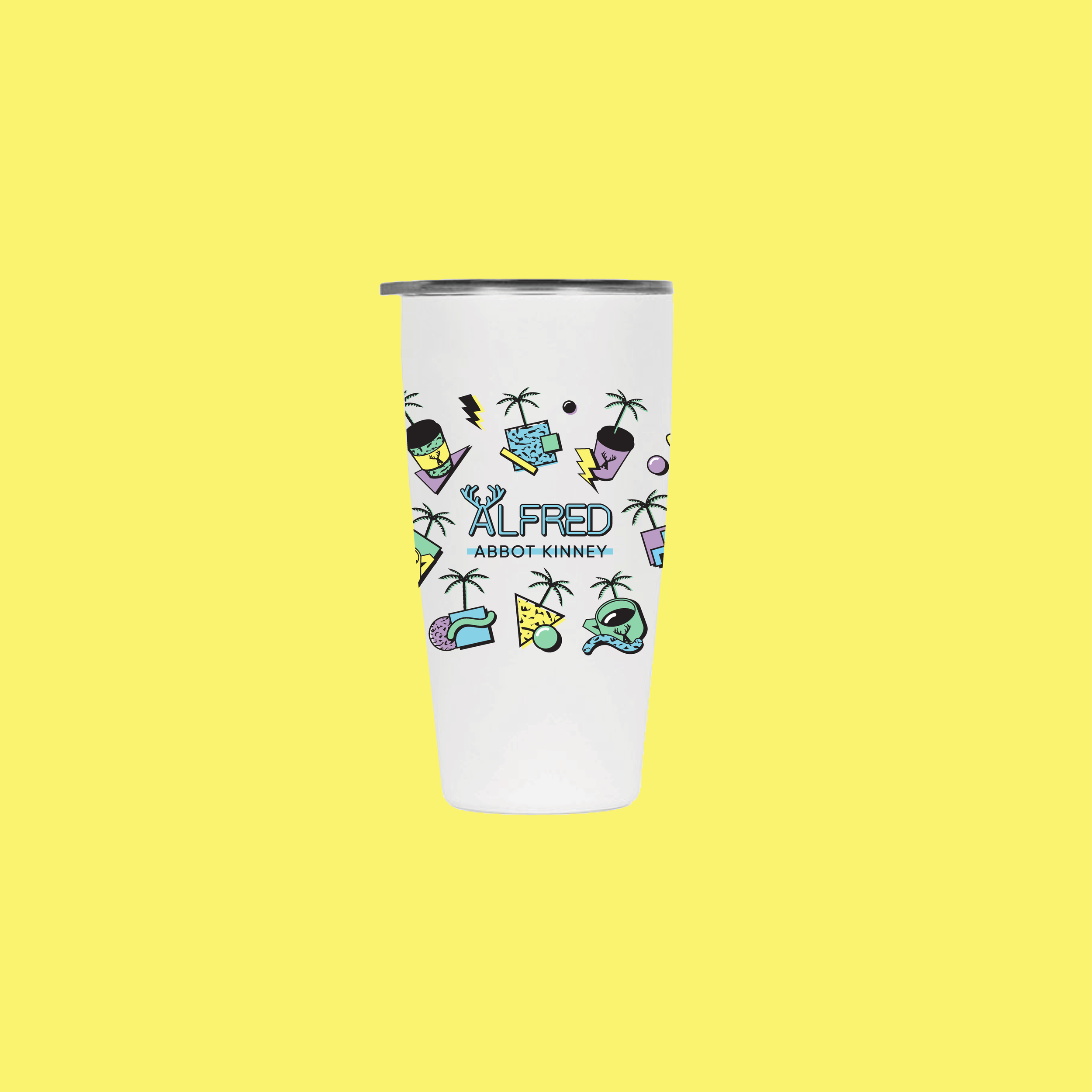 A colorful illustrated cup with tropical symbols and the name 'Alfred Abbot Kinney' on it, set against a bright yellow background.