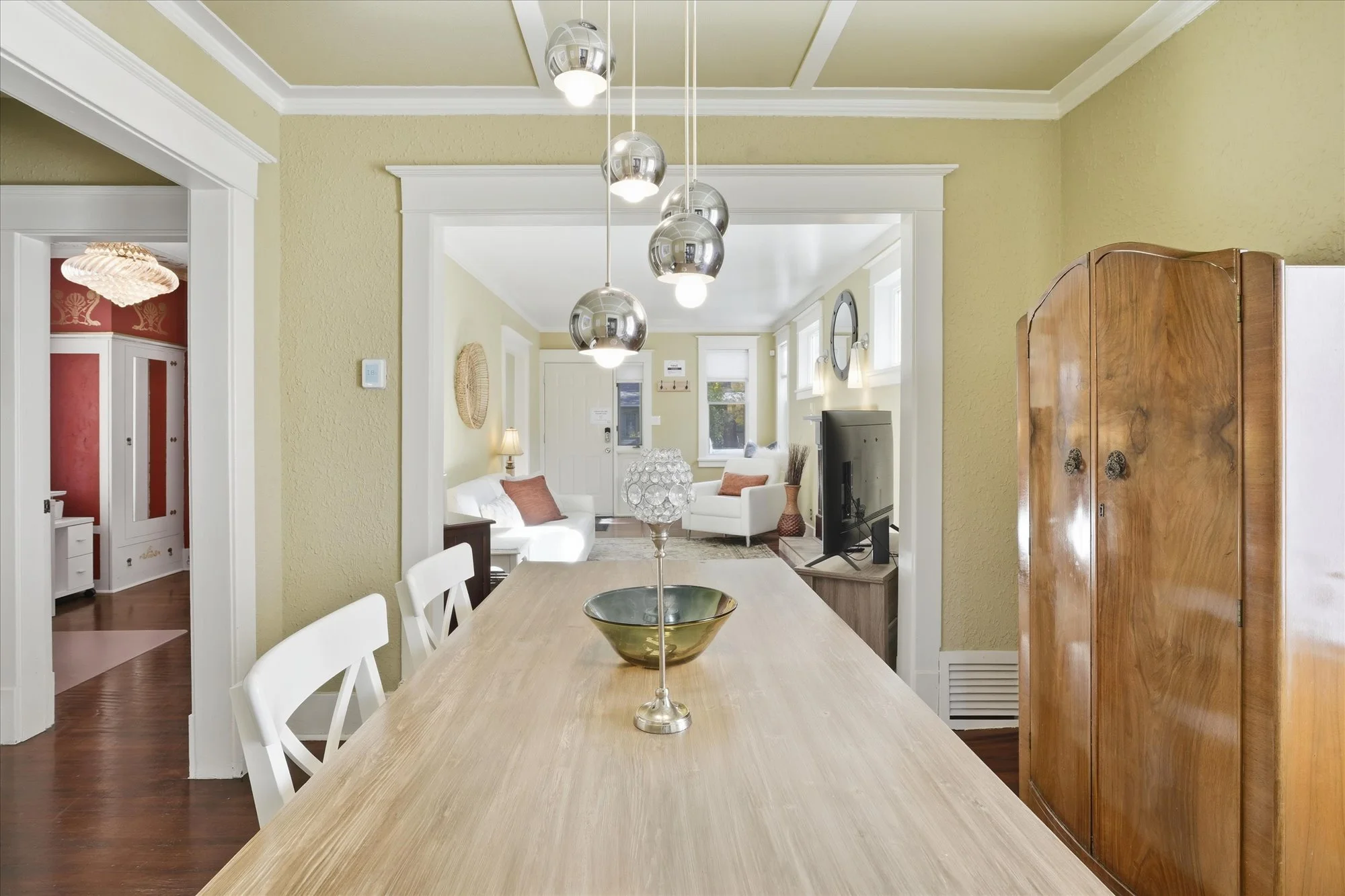 an antique armoire adorns the room.