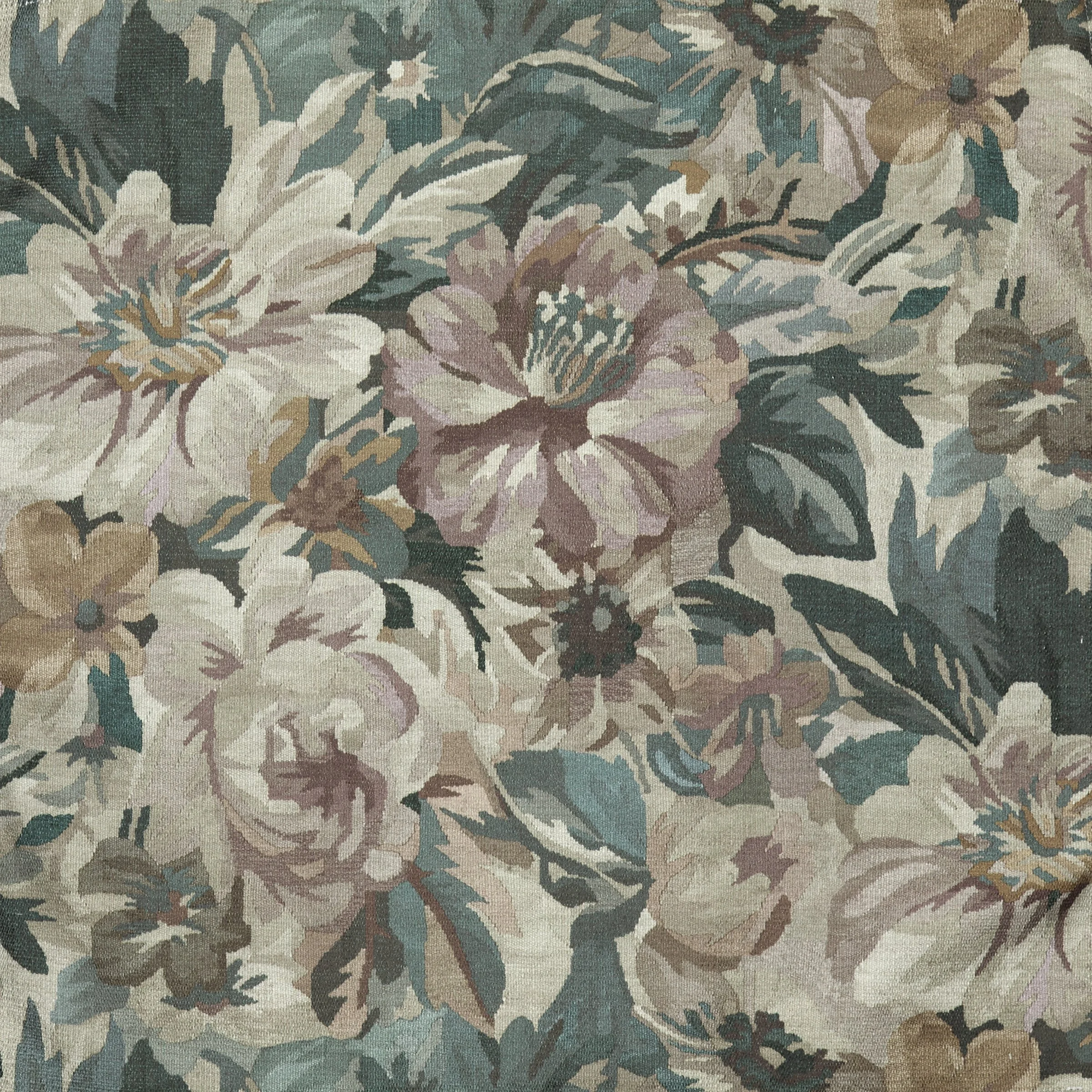 A floral patterned fabric with shades of green, beige, brown, and cream, featuring large flowers and leafy designs.