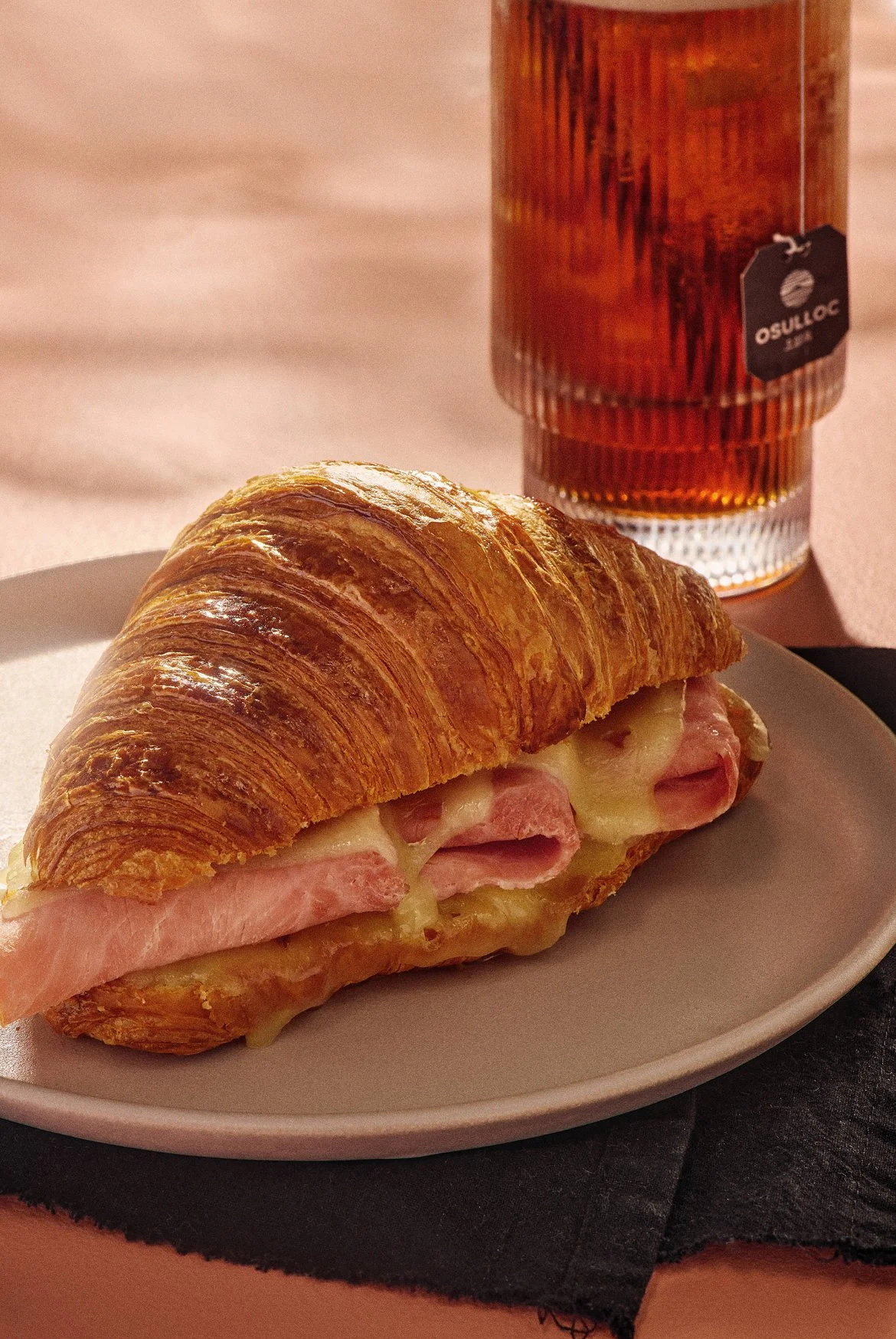 Ham & Swiss croissant, with an iced tea.