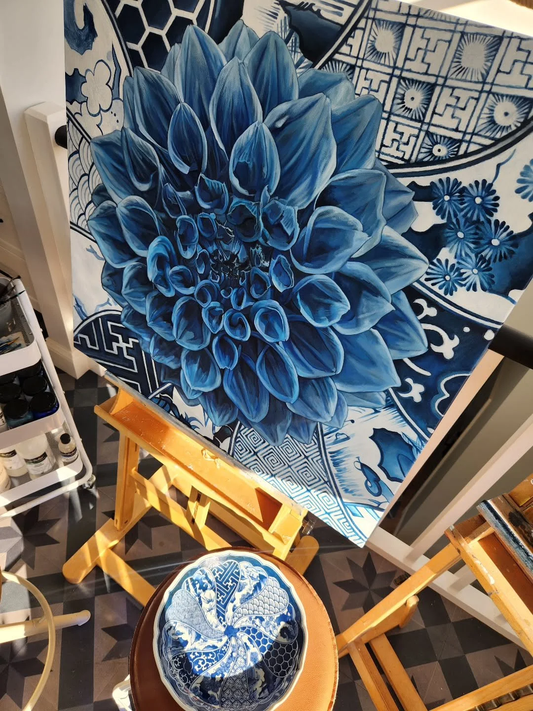 I'm continuing to work on this background today, which is inspired by the plate I recently found on marketplace. Originally I had planned using a fabric but loved the variety of patterning on this design behind the Dahlia. 

#blueandwhite #ceramics #