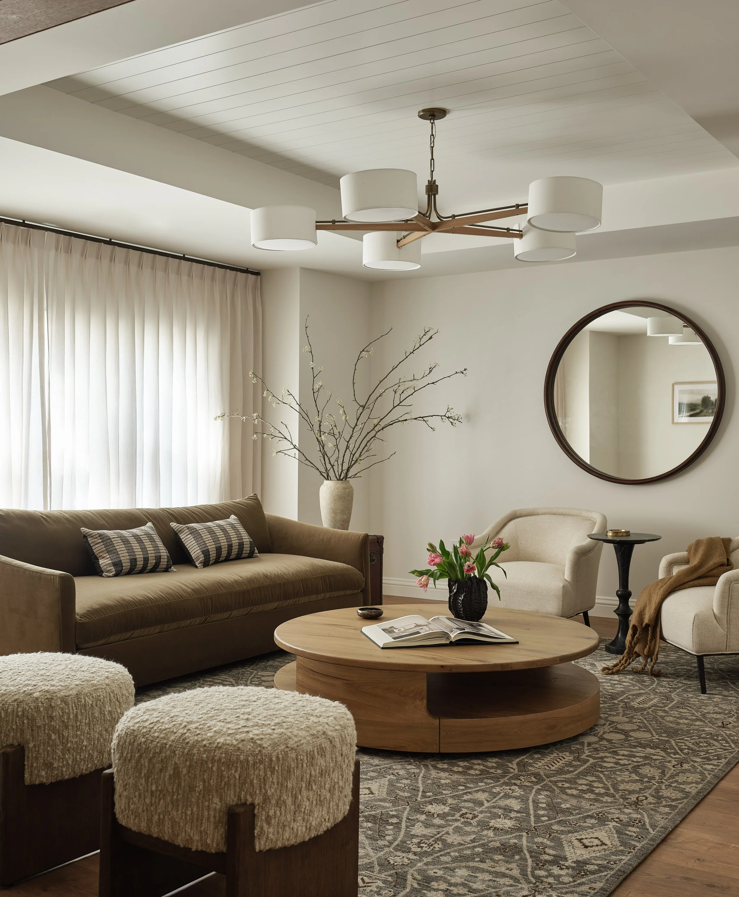 Cozy living room with layered textures and soft lighting in this thoughtfully designed Addition & Full Home Remodel.