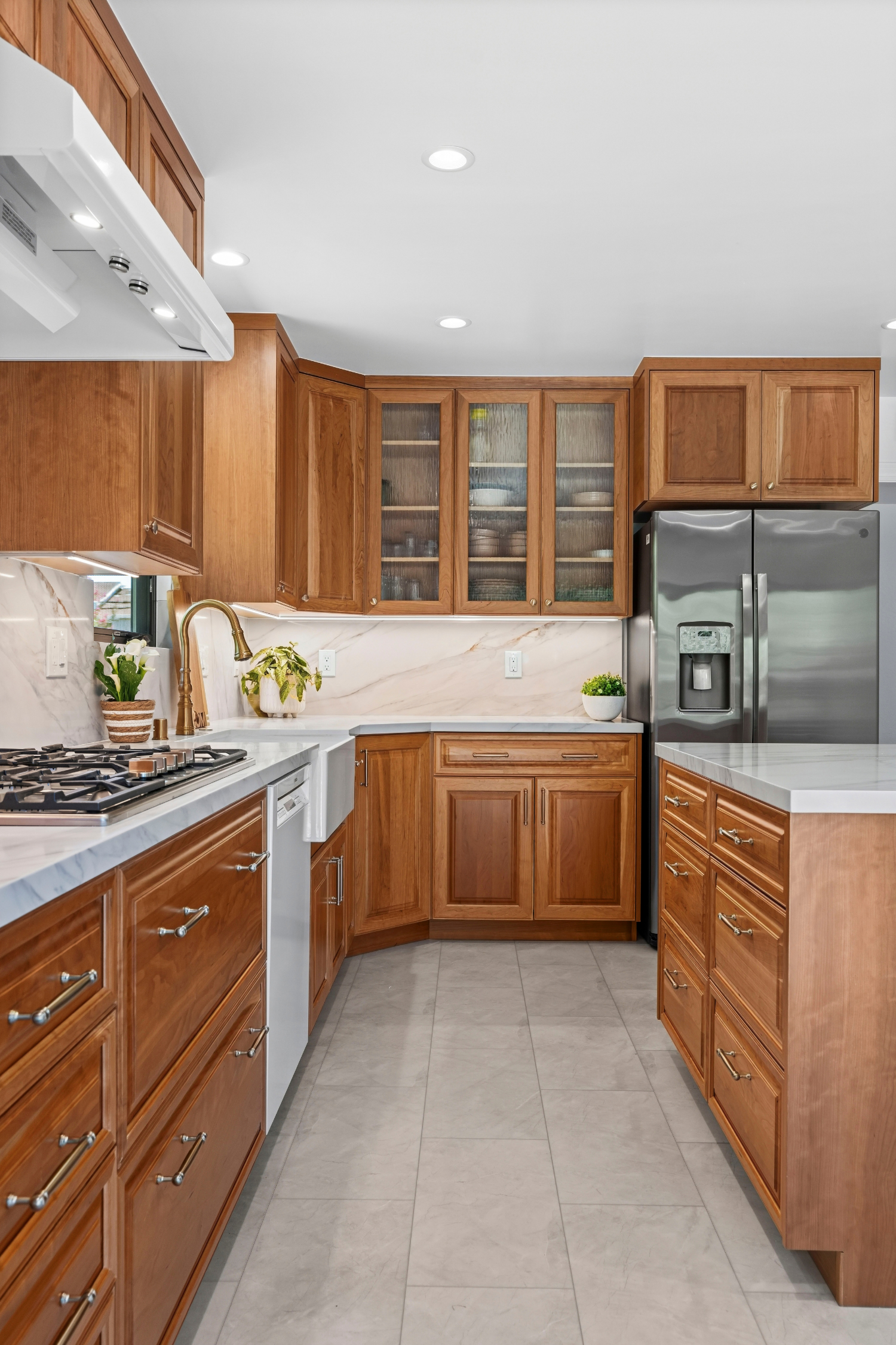 Custom kitchen addition in Los Gatos featuring handcrafted cabinetry, quartz countertops, and abundant storage.