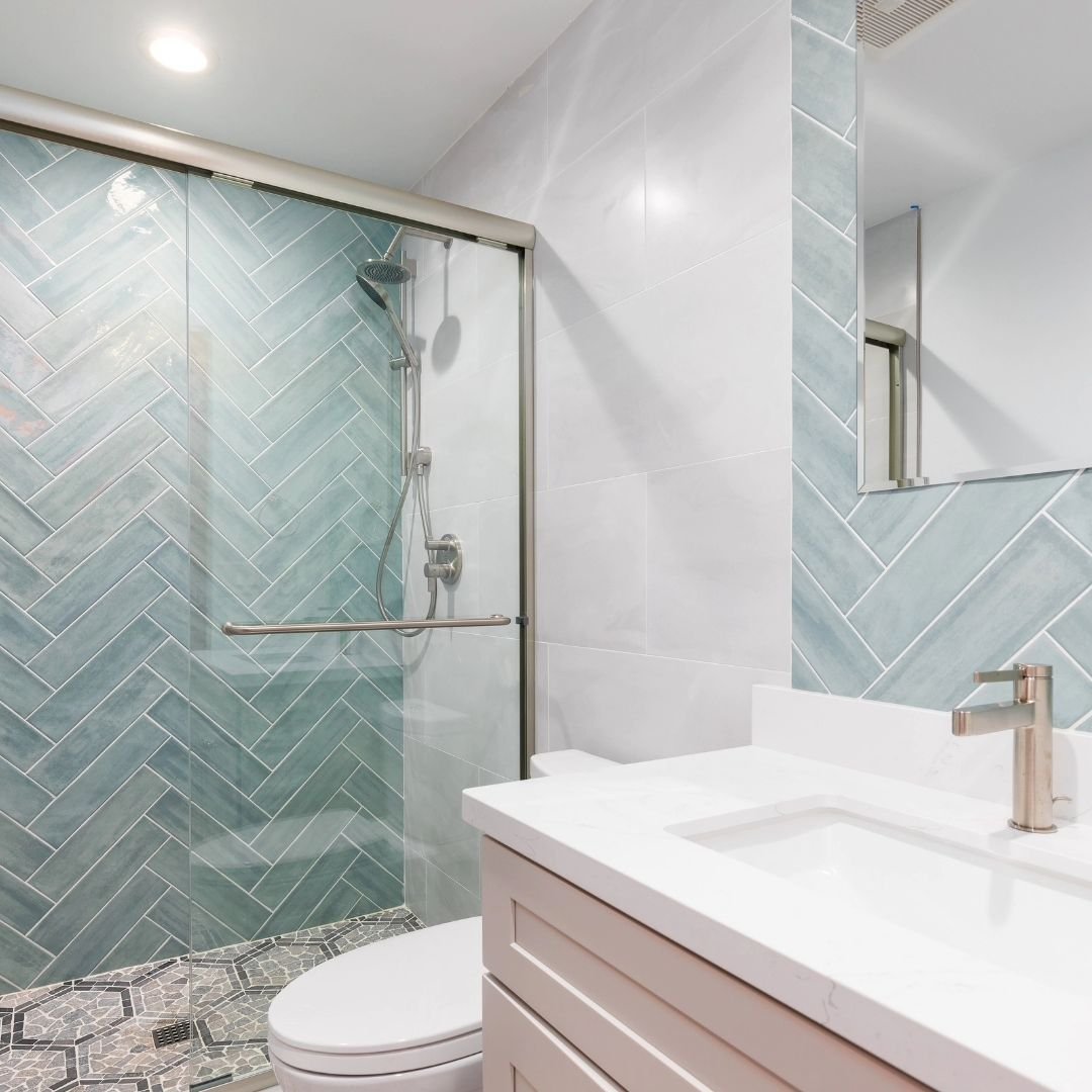 Admire the intricate tiling and elegant walk-in shower from our first-floor bathroom in a San Jose second-story addition. 

Whether you're considering a room addition, a complete remodel, or building a brand-new home, our team is ready to transform y