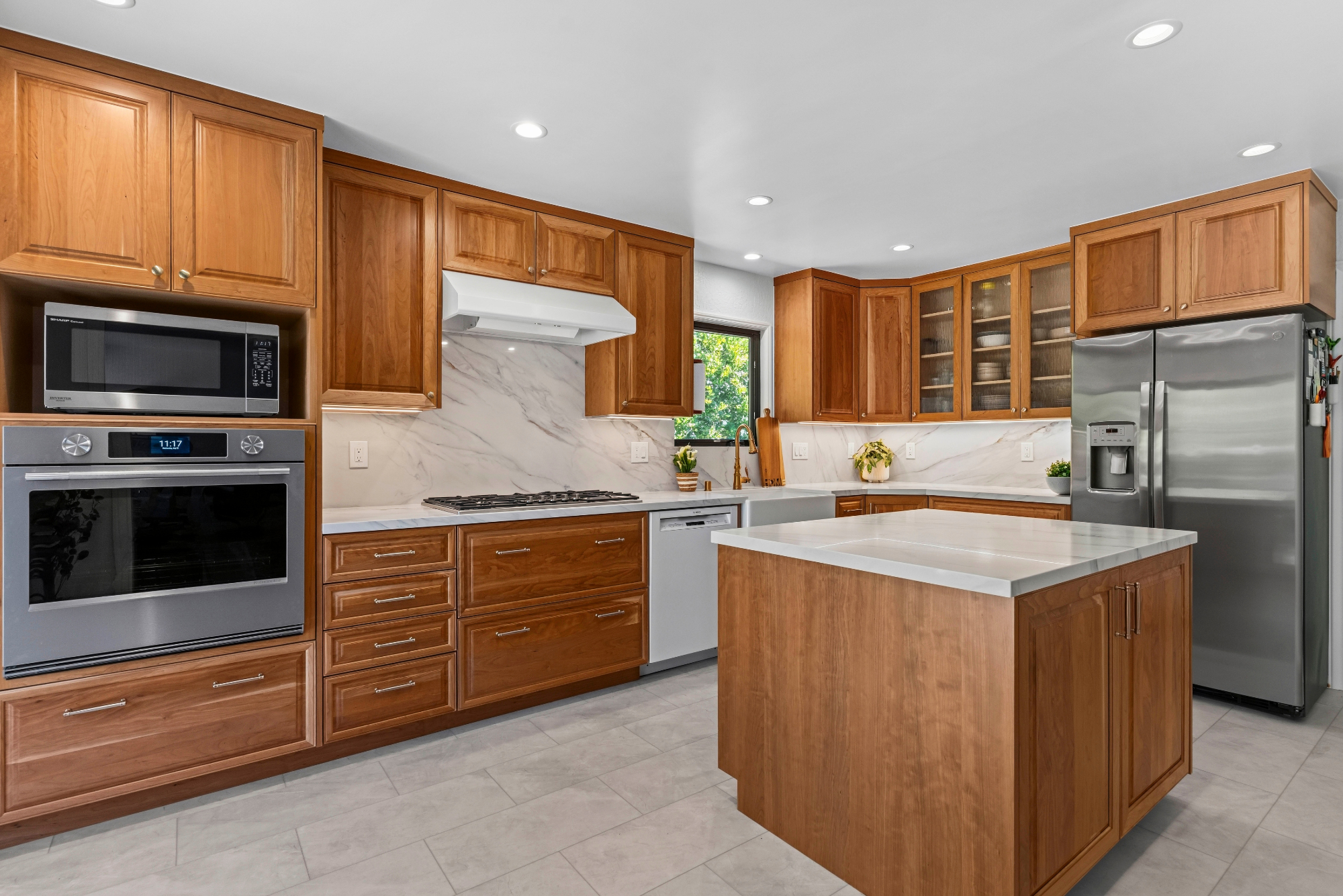 Custom kitchen addition in Los Gatos featuring handcrafted cabinetry, quartz countertops, and abundant storage.