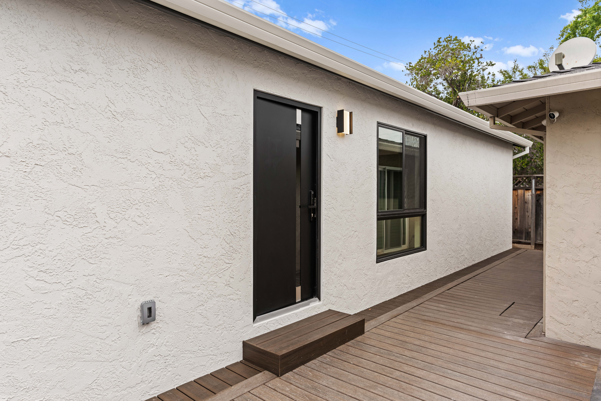 Private entrance to this Accessory Dwelling Unit in San Jose with composite decking and contemporary finishes.