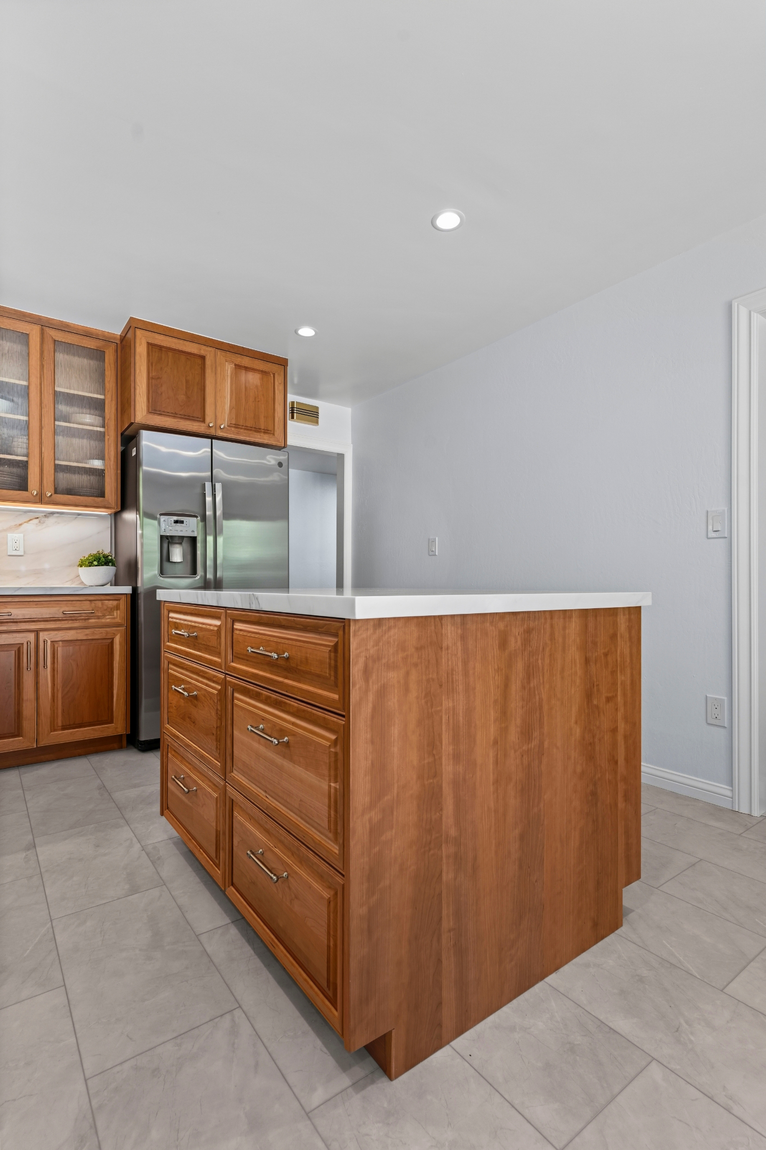 Custom kitchen addition in Los Gatos featuring handcrafted cabinetry, quartz countertops, and abundant storage.