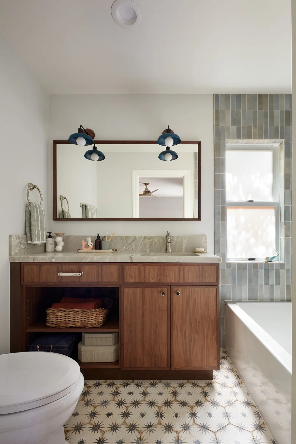 Refined bath with soaking tub and custom tile surround – custom home remodel