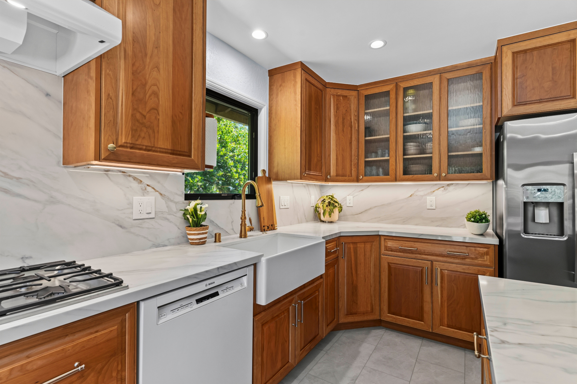 Custom kitchen addition in Los Gatos featuring handcrafted cabinetry, quartz countertops, and abundant storage.