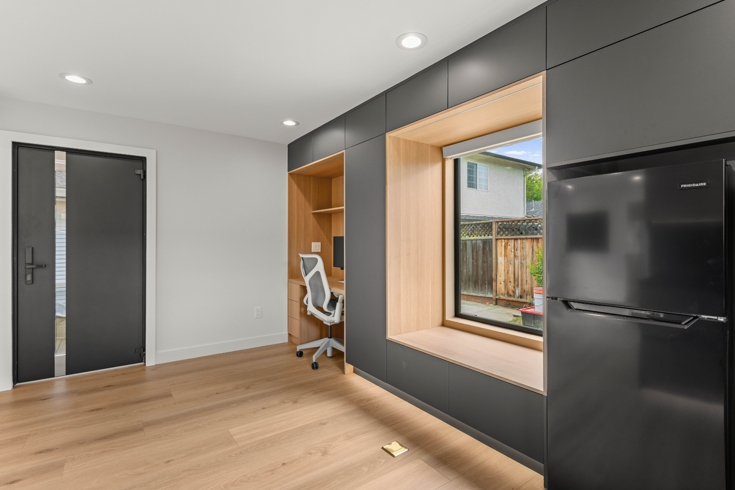 Accessory Dwelling Unit in San Jose featuring a built-in office nook, window seat, and modern design.
