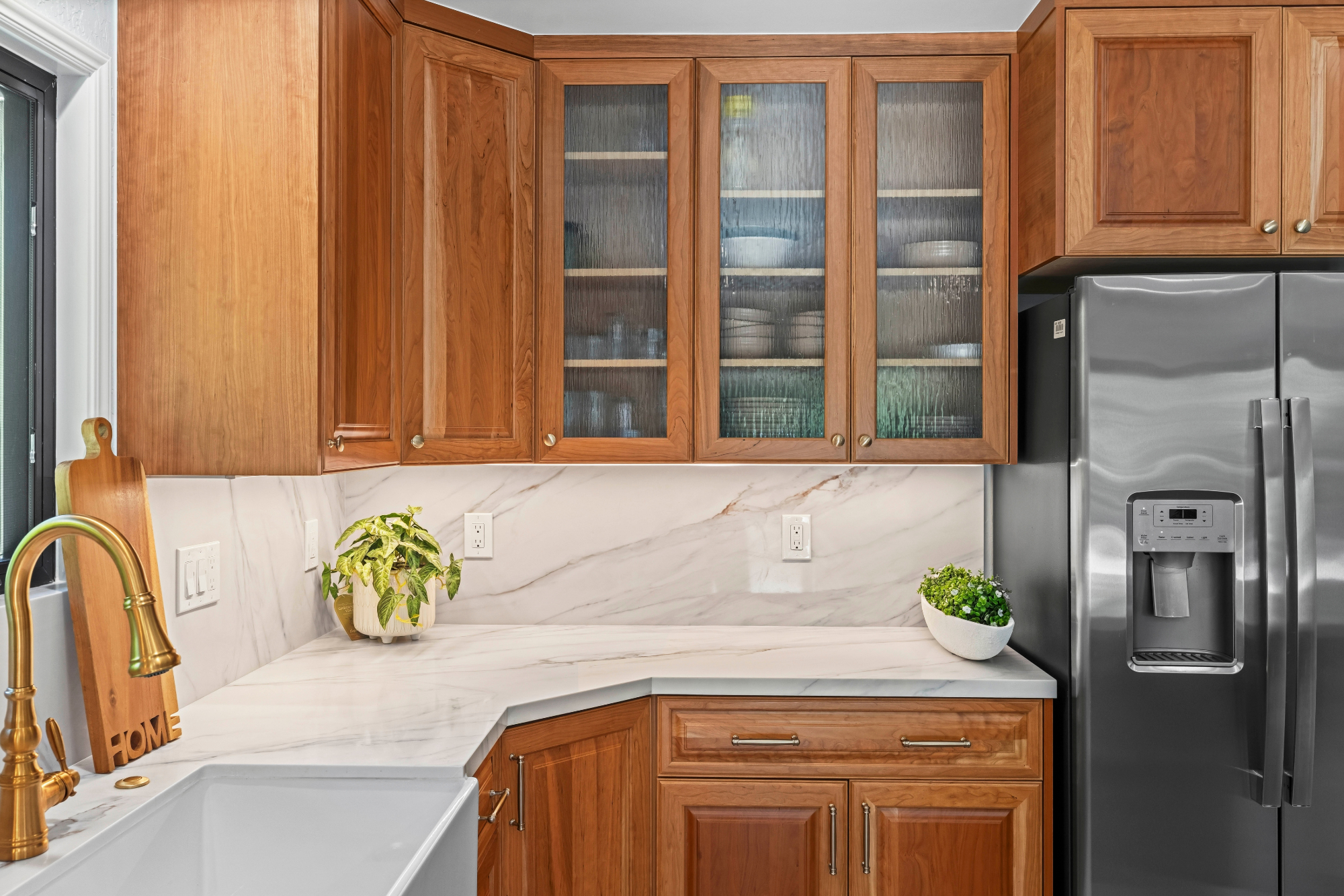 Custom kitchen addition in Los Gatos featuring handcrafted cabinetry, quartz countertops, and abundant storage.