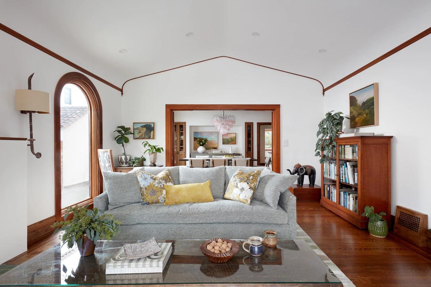 Elegant living room flow with restored character, refined finishes, and thoughtful layout for modern family life.