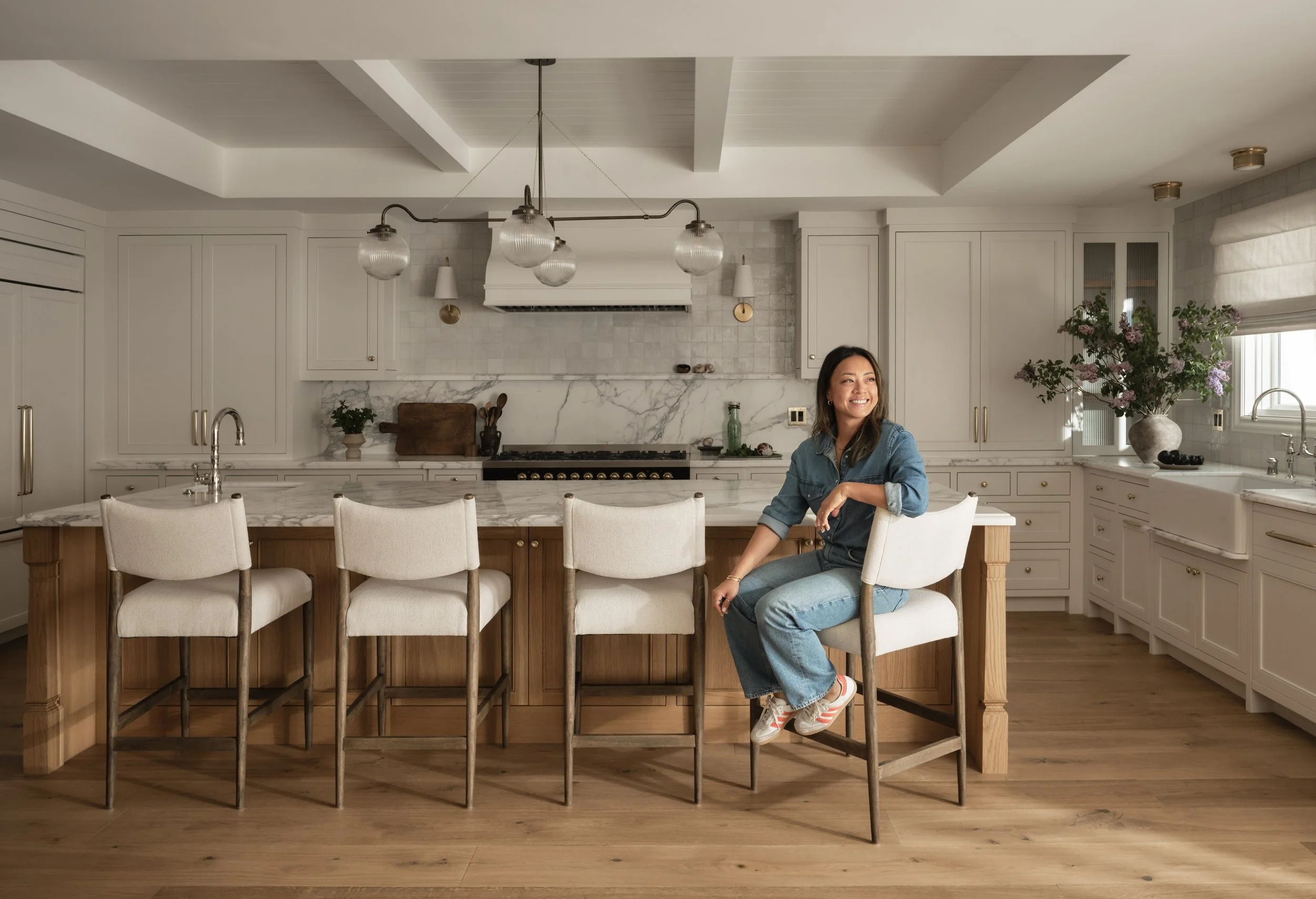 Elegant kitchen design blending natural wood and white cabinetry in this Addition & Full Home Remodel in Santa Clara.