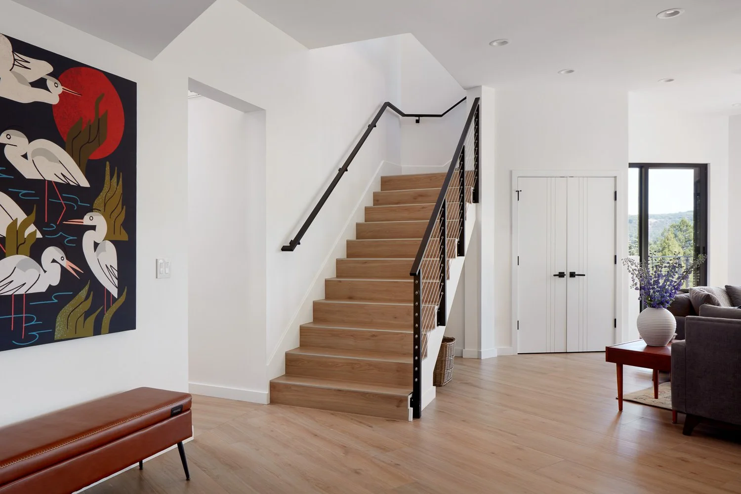 Clean lines and thoughtful details guide movement through the home, blending function with modern design.