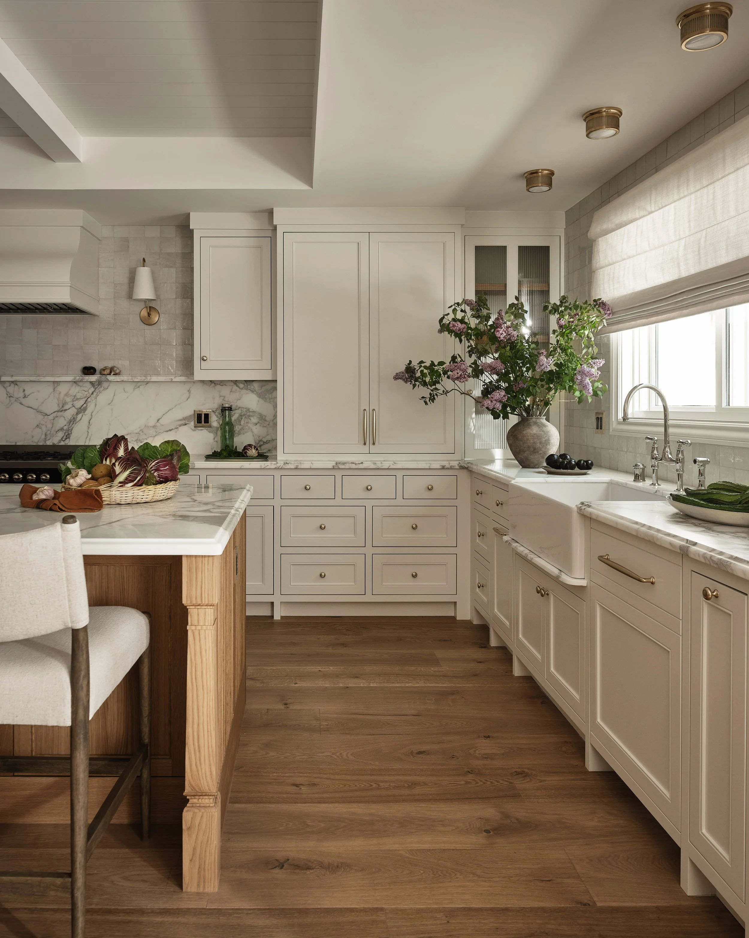 Functional kitchen layout with ample storage and high-end details in this Addition & Full Home Remodel.