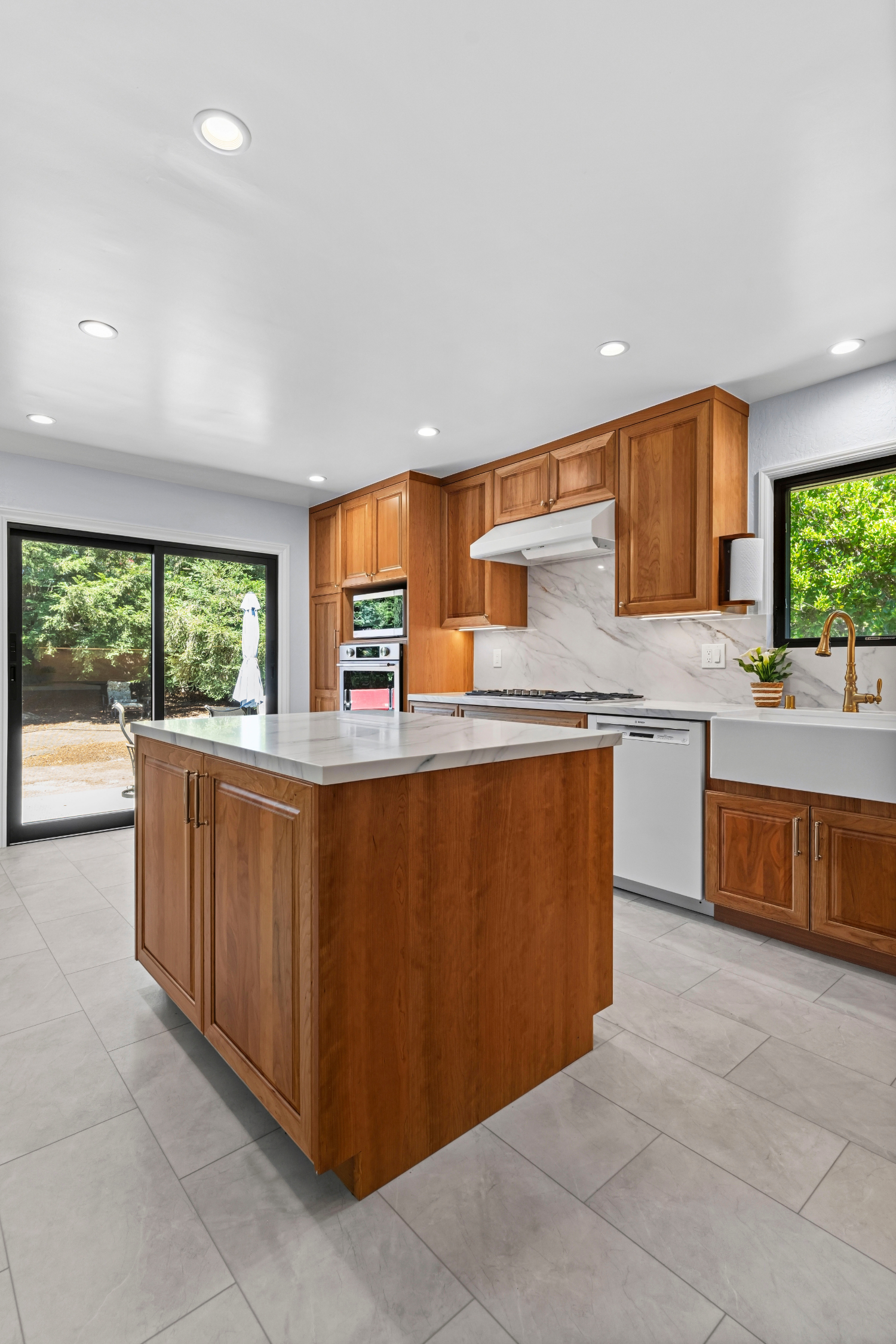 Custom kitchen addition in Los Gatos featuring handcrafted cabinetry, quartz countertops, and abundant storage.