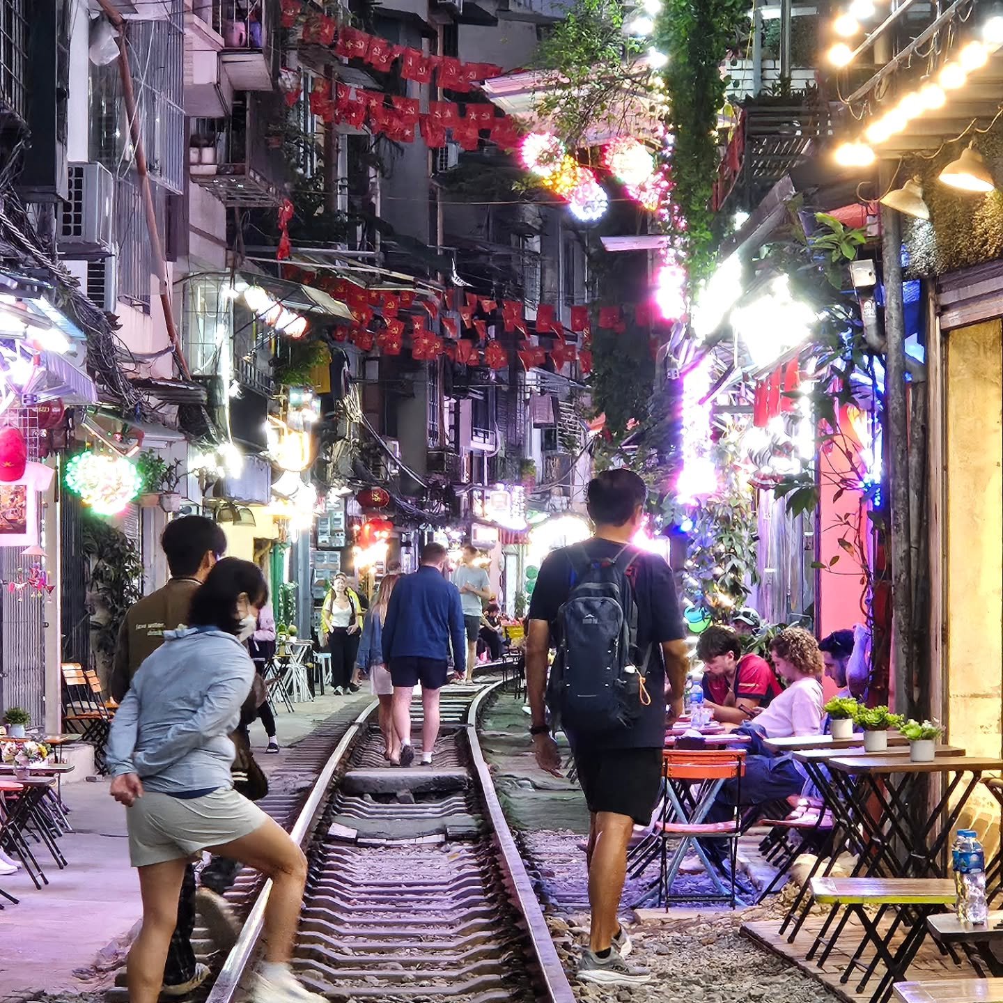 Catching the train on Train Street, Hanoi. An exciting buzz that grows and grows as the time for the train gets closer and closer. So many people (some drunk) one moving train, so close you could touch it, but don't just swivel your legs in. No one d