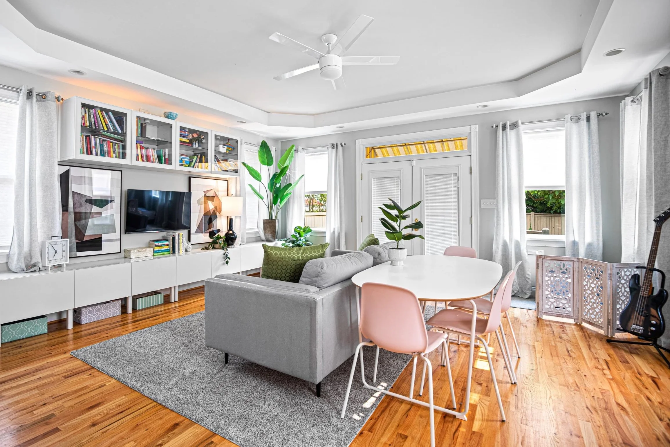 Bright and spacious living room with an elegant dining area.