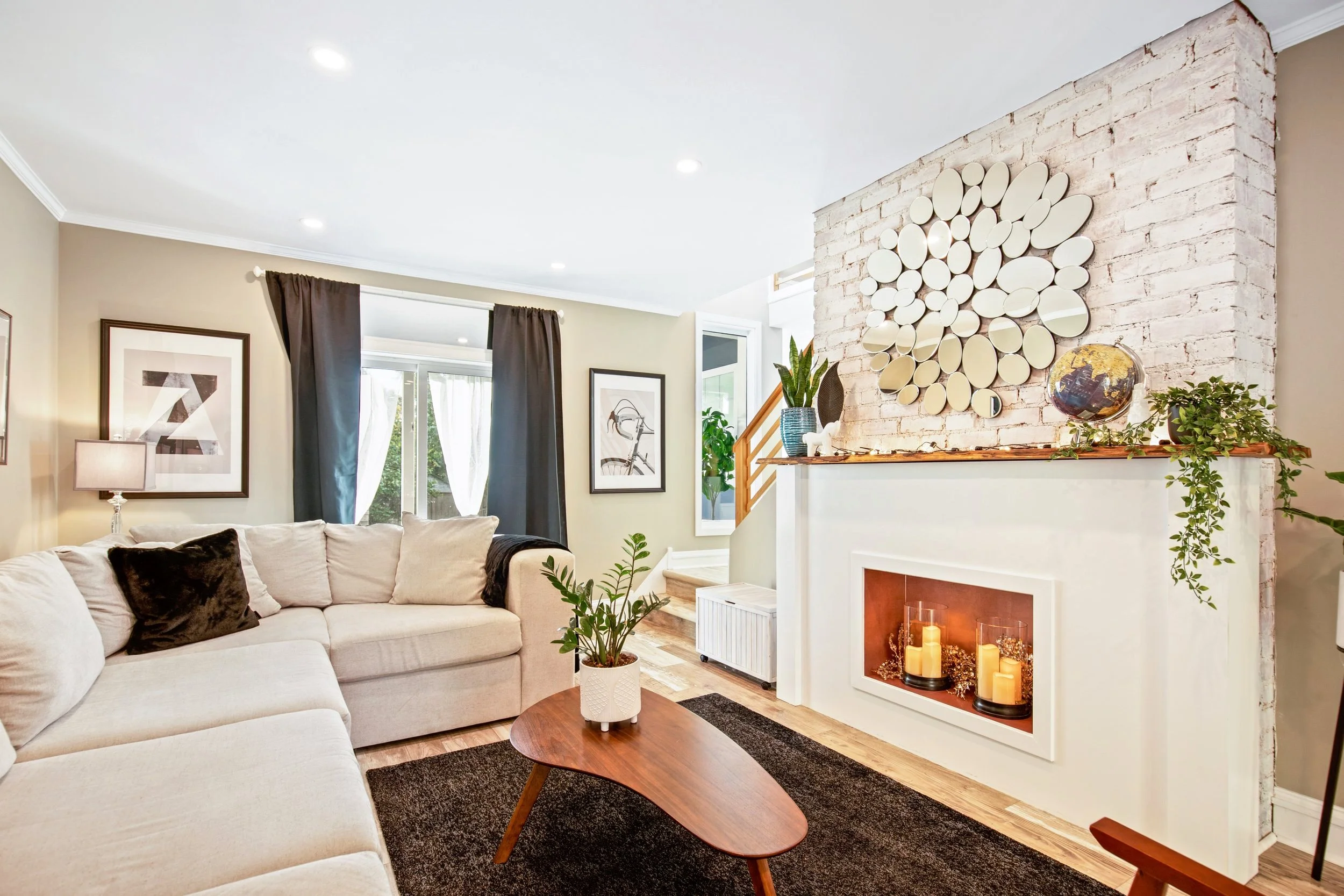 Sink into the plush couch after exploring Lewis Ginter Botanical Gardens (5 minutes away!) or unwind by the elegant fireplace.