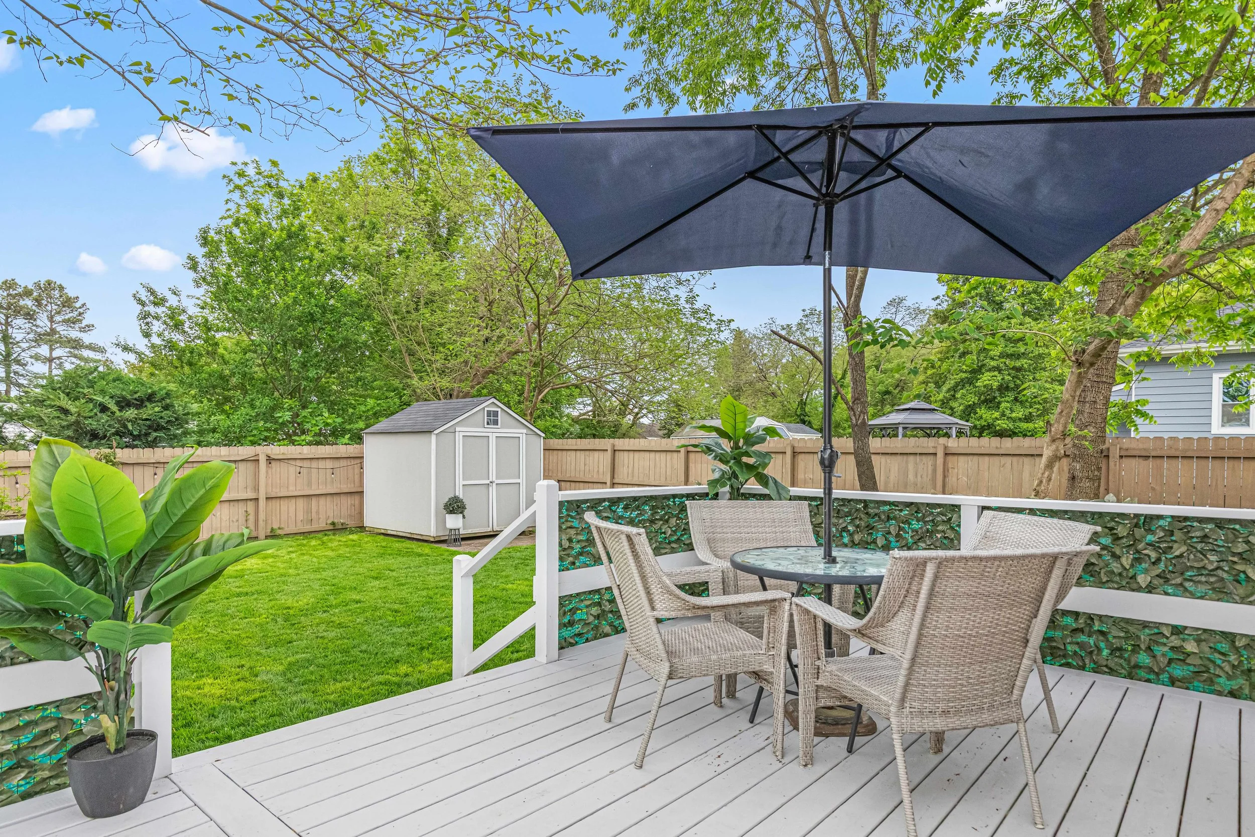 Unwind on the deck with views of the landscaped backyard, plenty of greenery, and birdsong all around.