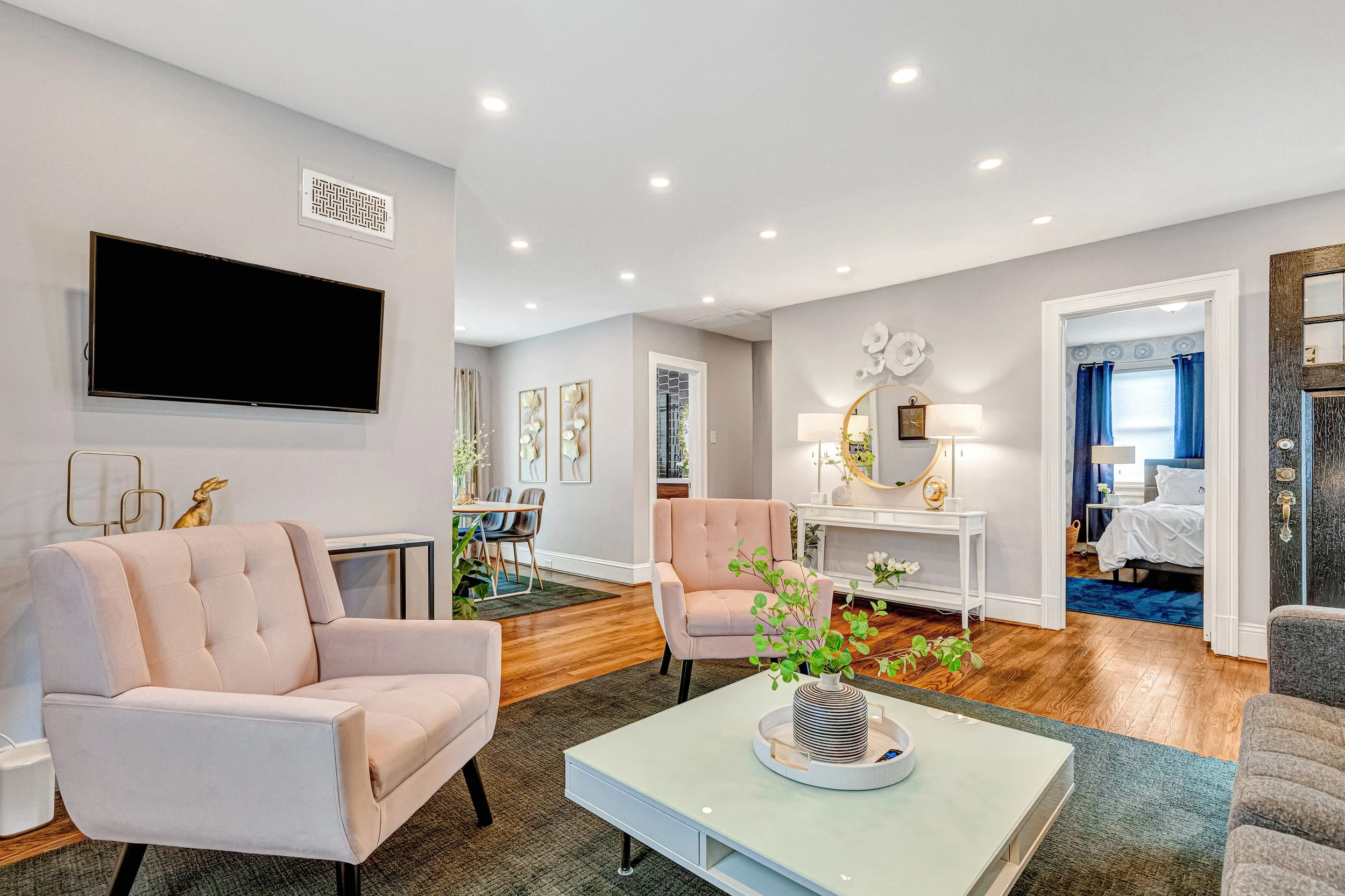 The stylish living room, bedroom, bathroom, dining room and kitchen flow together seamlessly.