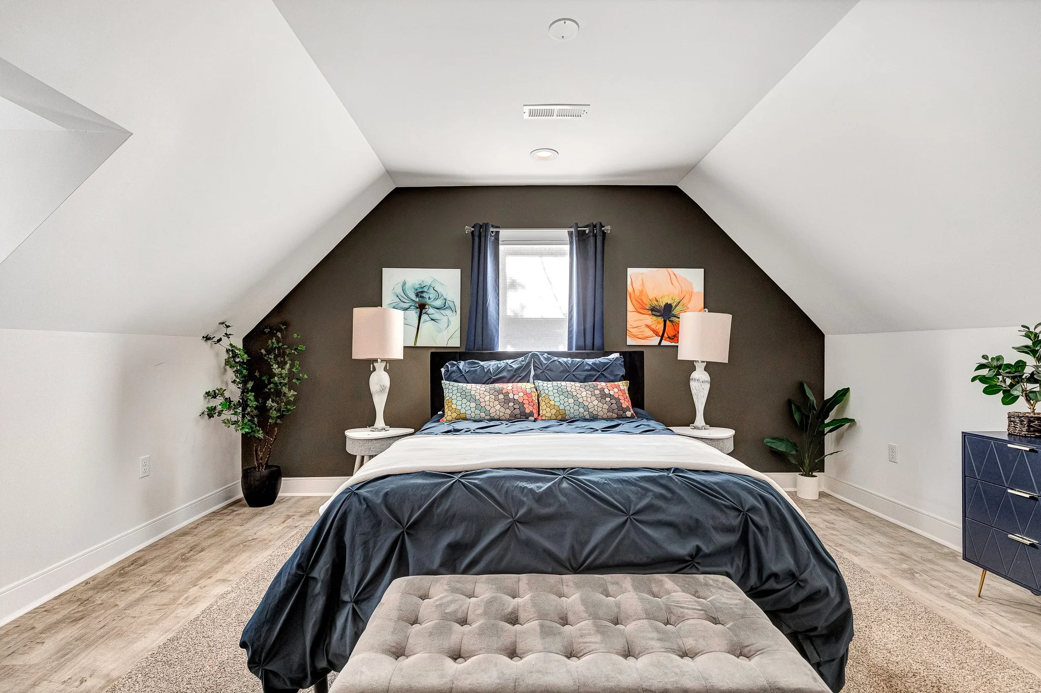 Spacious upstairs Master Suite with vaulted ceilings and abundant natural light.