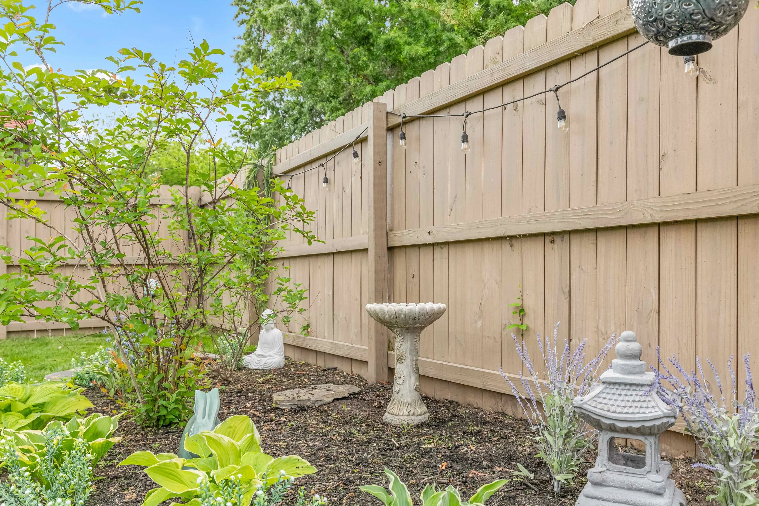 Garden lights create a beautiful ambiance in the backyard and Zen garden in the evenings. 