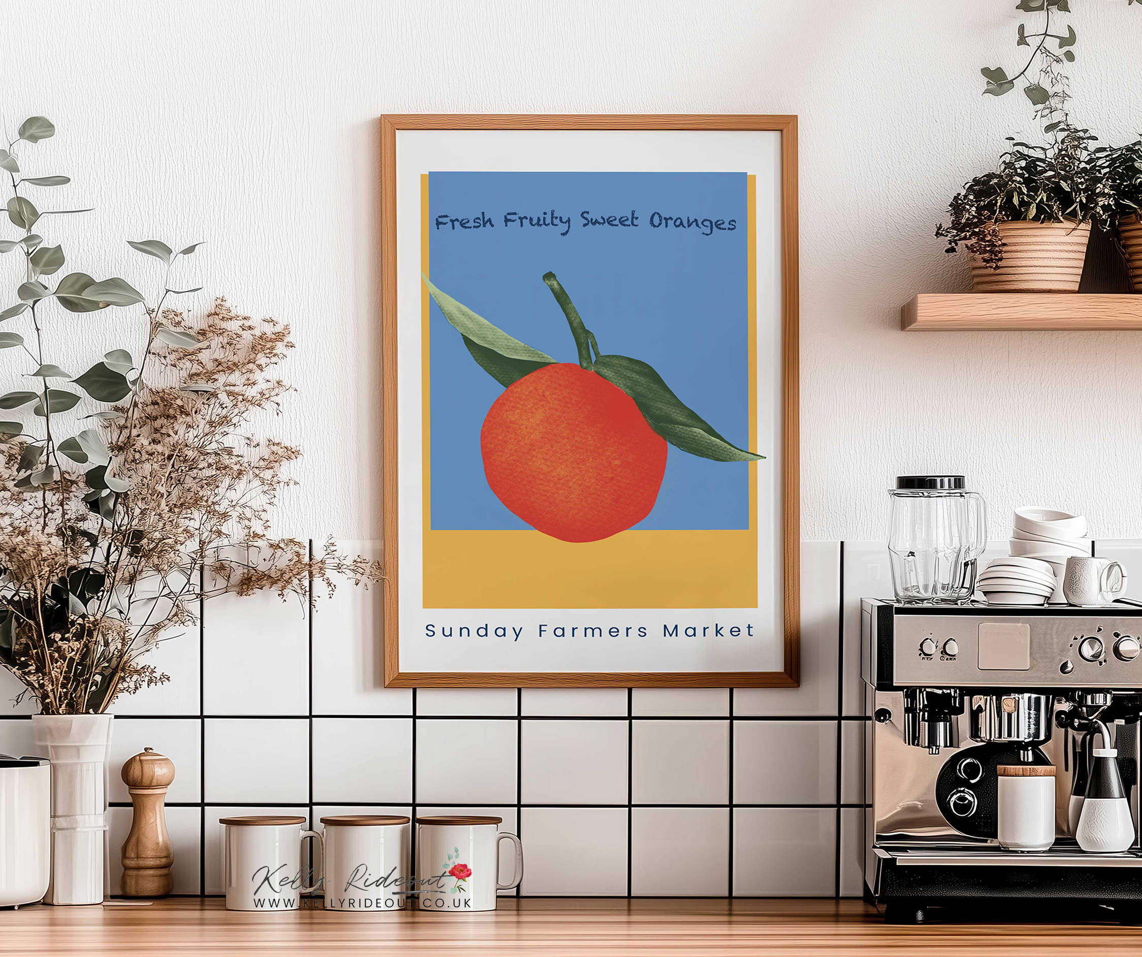 Orange Art Print for a kitchen with a framed poster, orange with leaves, labeled 'Fresh Fruity Sweet Oranges' and 'Sunday Farmers Market', surrounded by plants and kitchenware including a coffee machine.