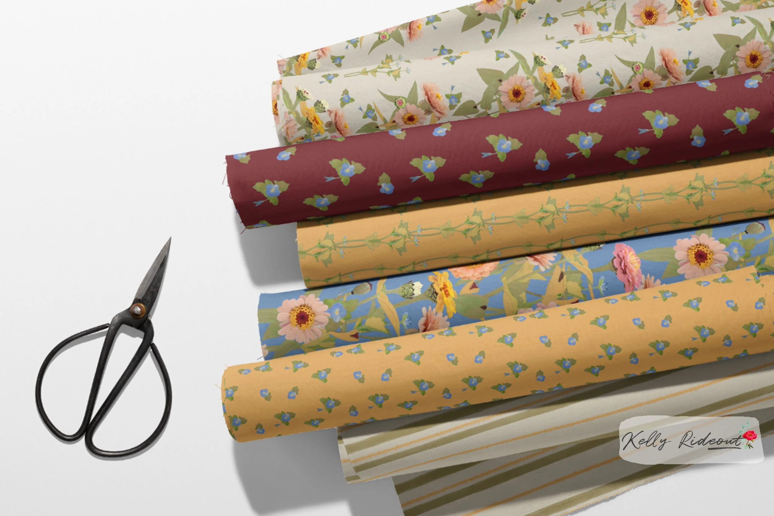 Zinnia English Garden Fabric Designs on six rolls of fabric in mustards, deep red and blues