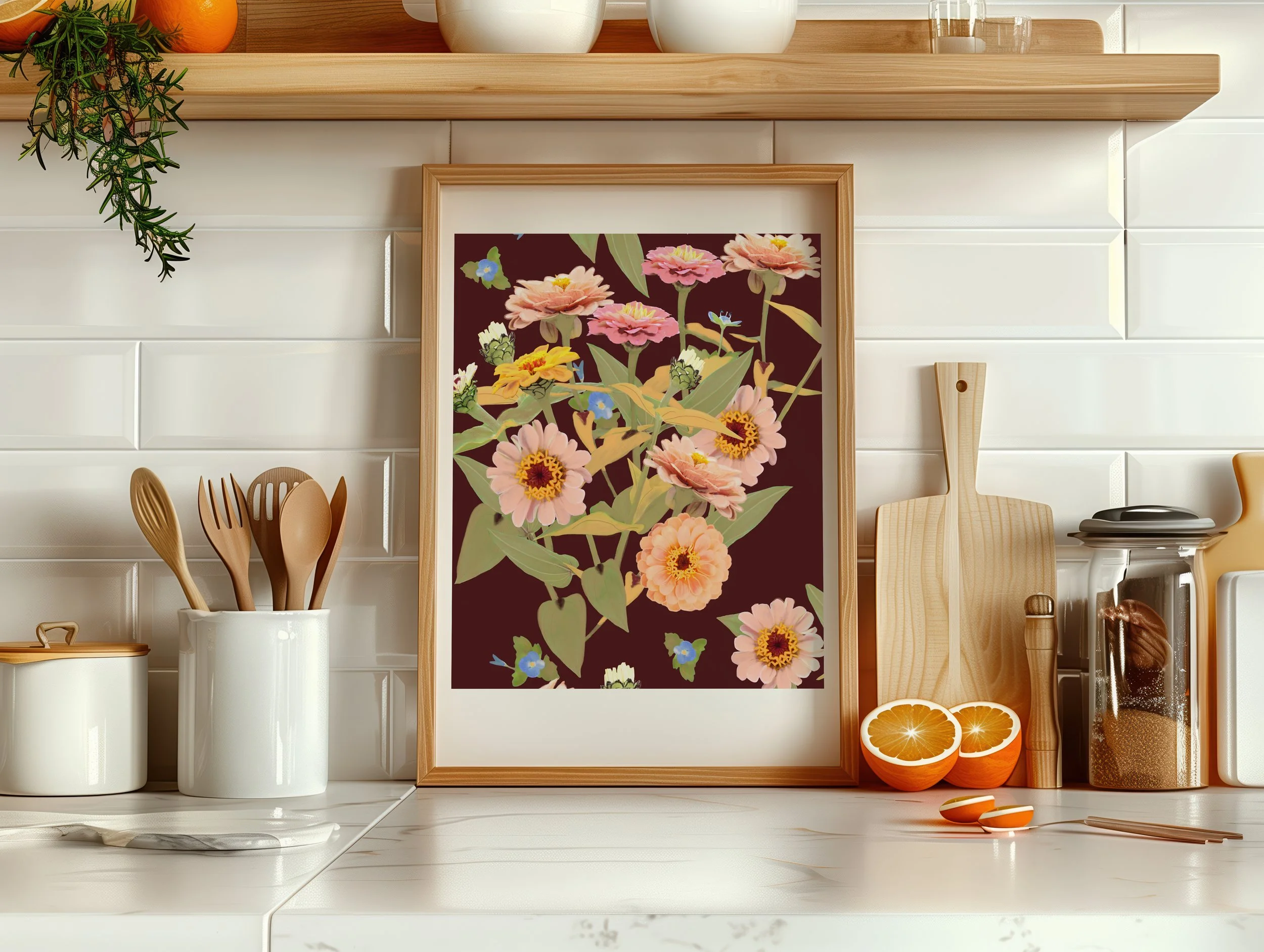 Botanical flower bouquet kitchen art, a framed floral artwork, wooden utensils in a white container, sliced oranges, a cutting board, and kitchen appliances on a white tiled wall background.