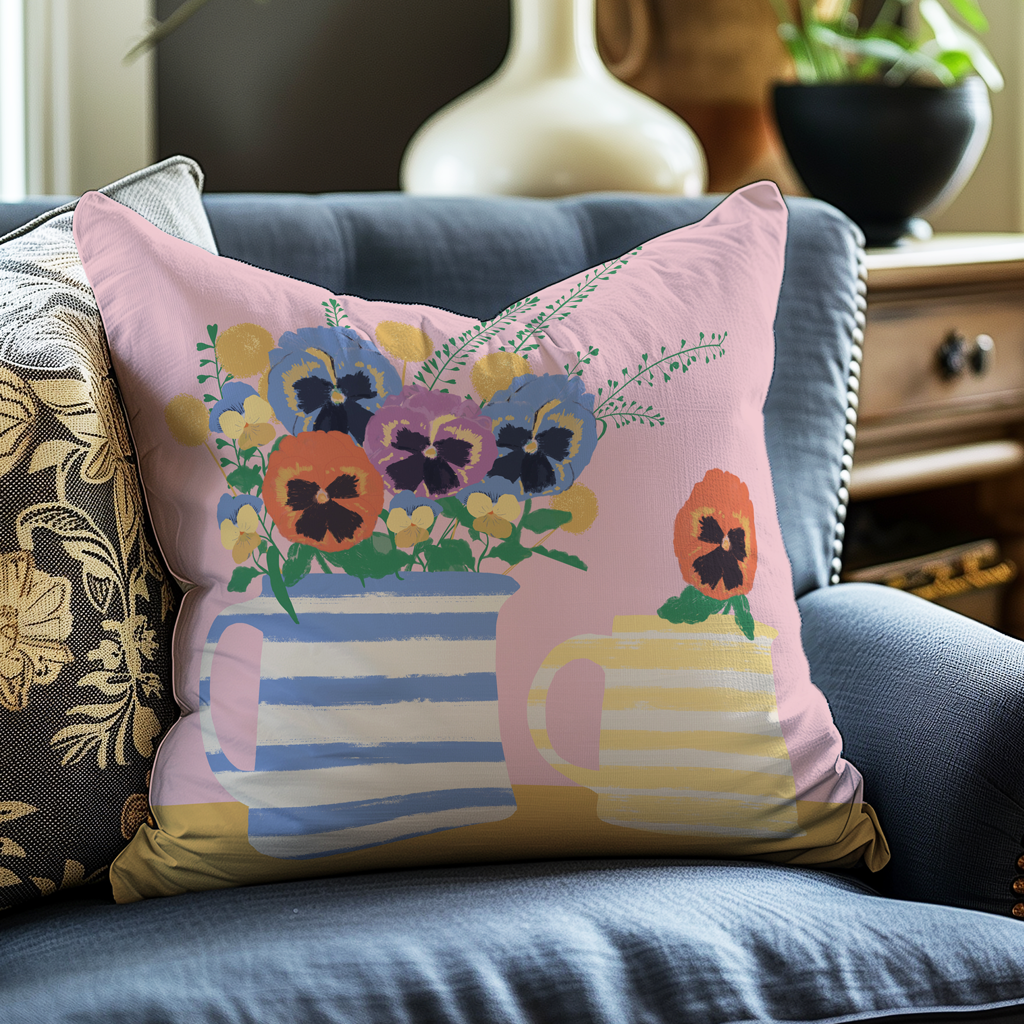 Pansy-and-Volia-Cushion-on-Blue-armchair-web.png