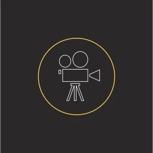 Close-up of a circular adjustable light control dial with a sun icon in the center on a black background.