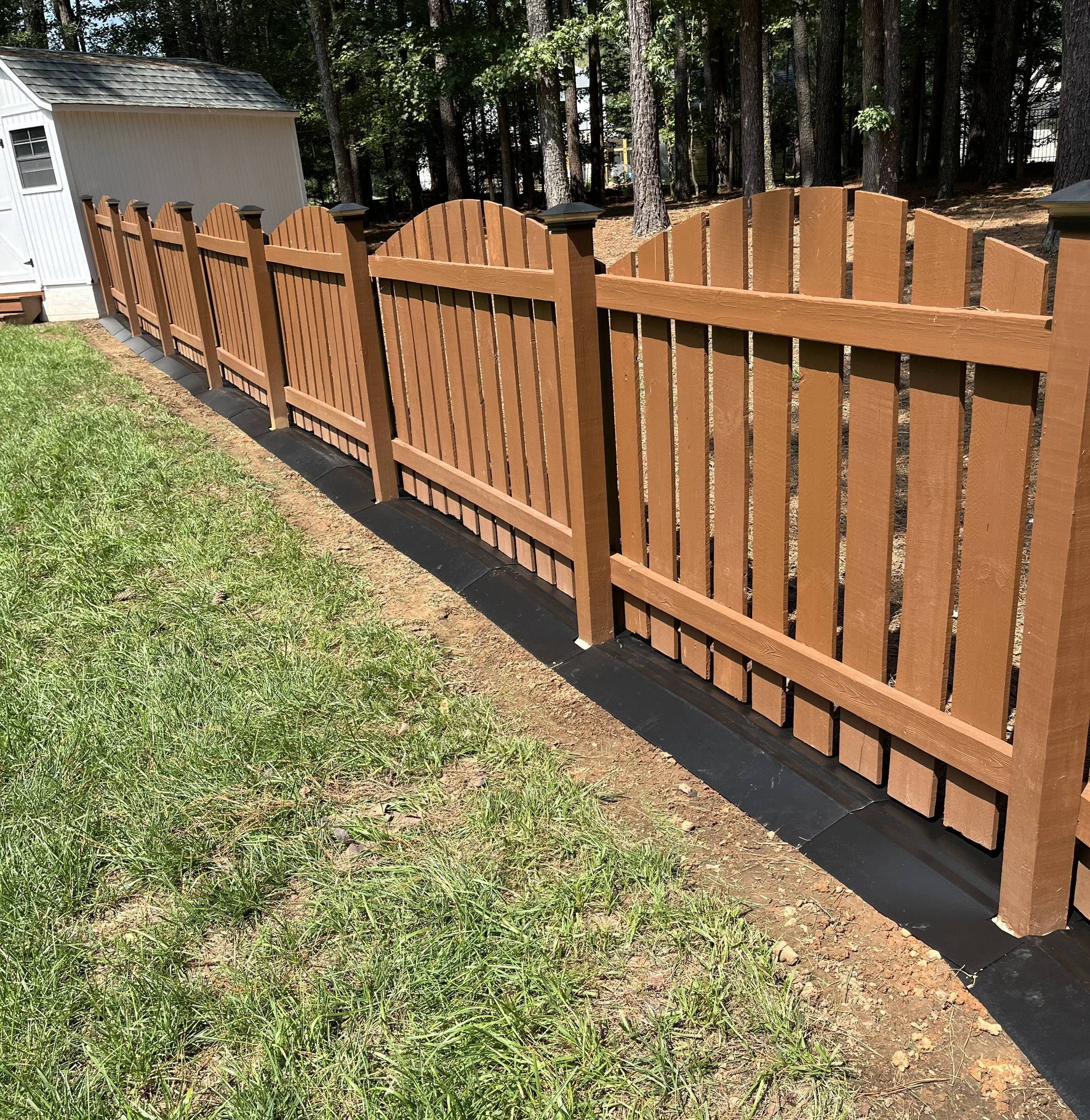 UnderFence Under Wood Fencing (1 of 1).jpeg