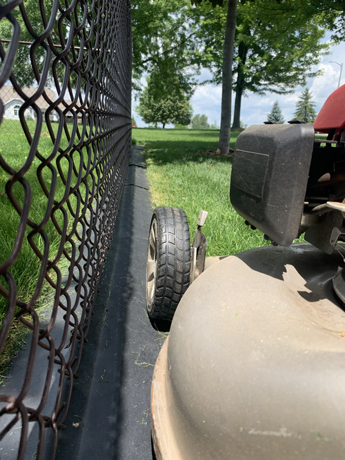 FG+Push+Mower+on+Chain+Link+(July,+2020).png