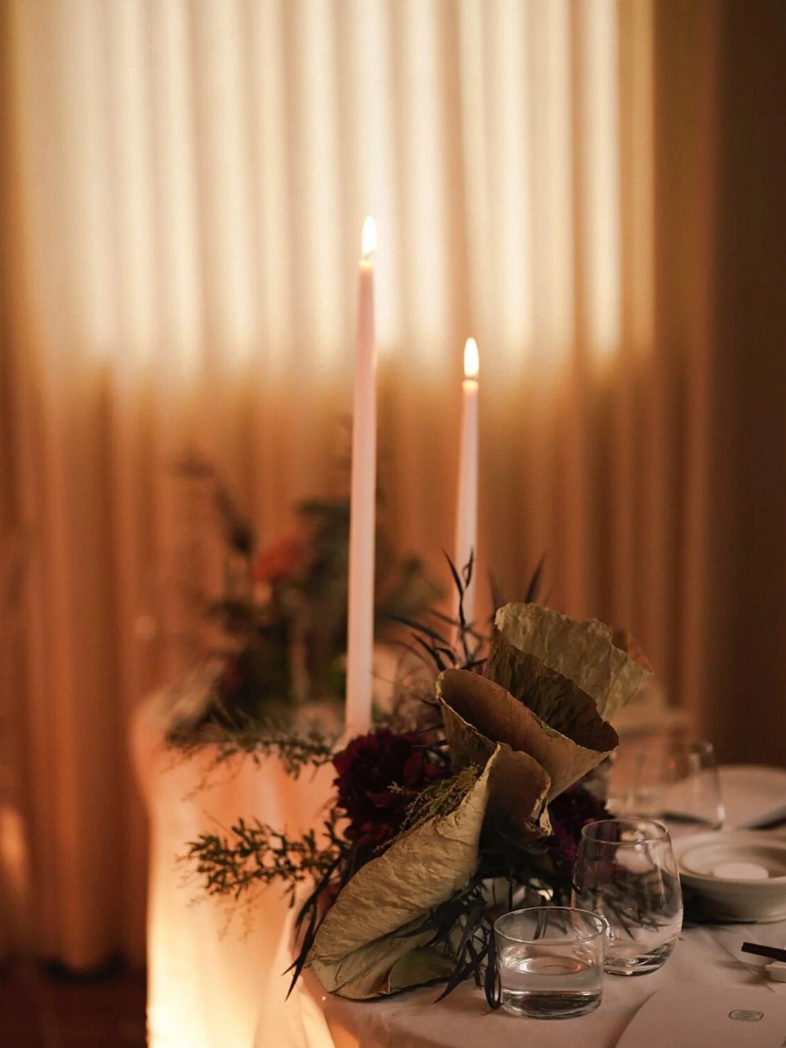 Lately, I&rsquo;ve been drawn to designing with unexpected ingredients that tell a deeper story.

For this candlelit dinner, dried lotus leaves took center stage, layered alongside mushrooms, walnuts in their shells, and rich burgundy peonies. The en